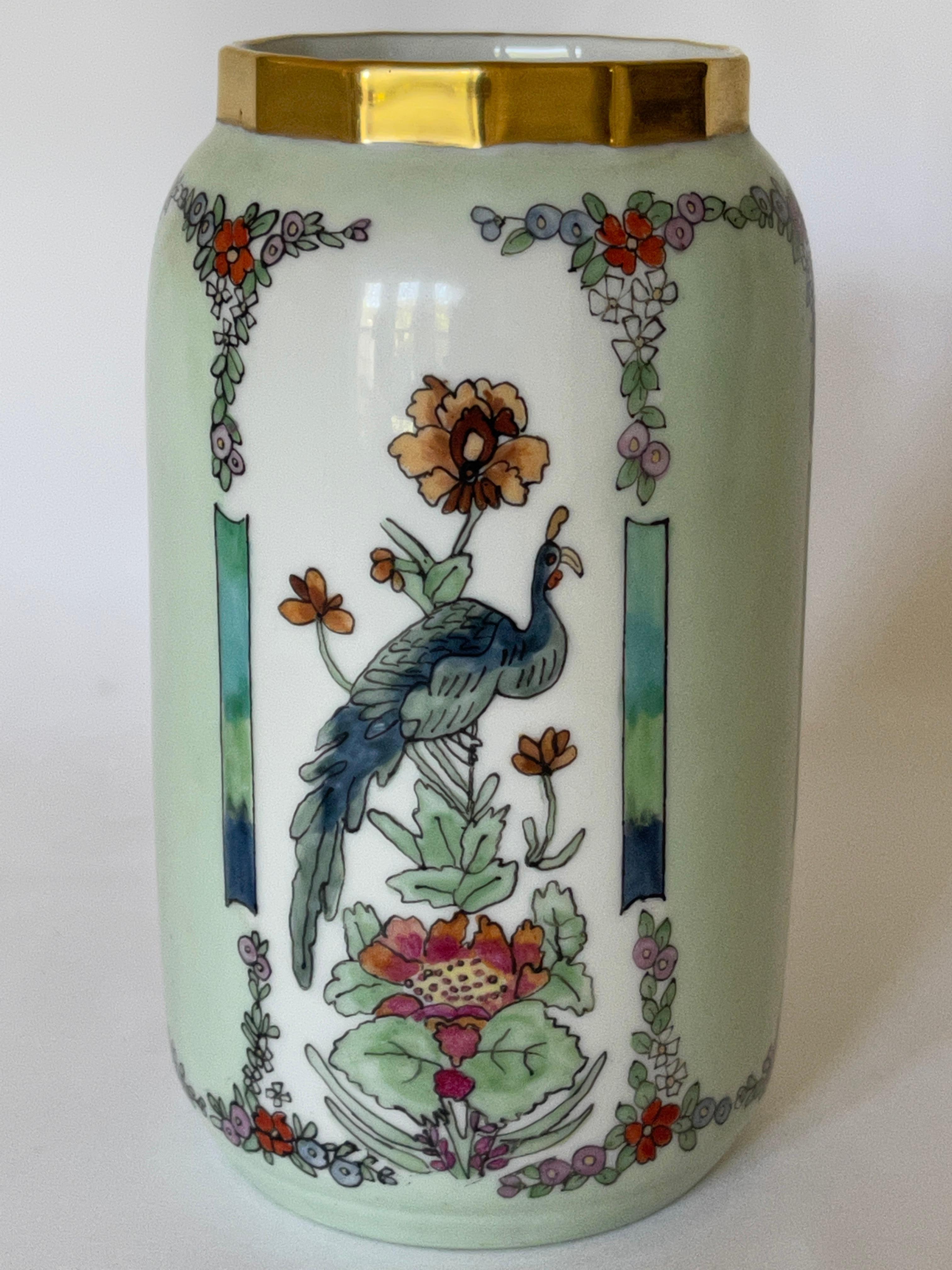 Art Deco Schonwald Bavaria vase, hand painted enameled vase with peacocks and floral motifs, exquisitely crafted. Signed on bottom with Schonwald factory mark that dates from 1919-1927., and impressed model number. 
Artist signed Ellsie