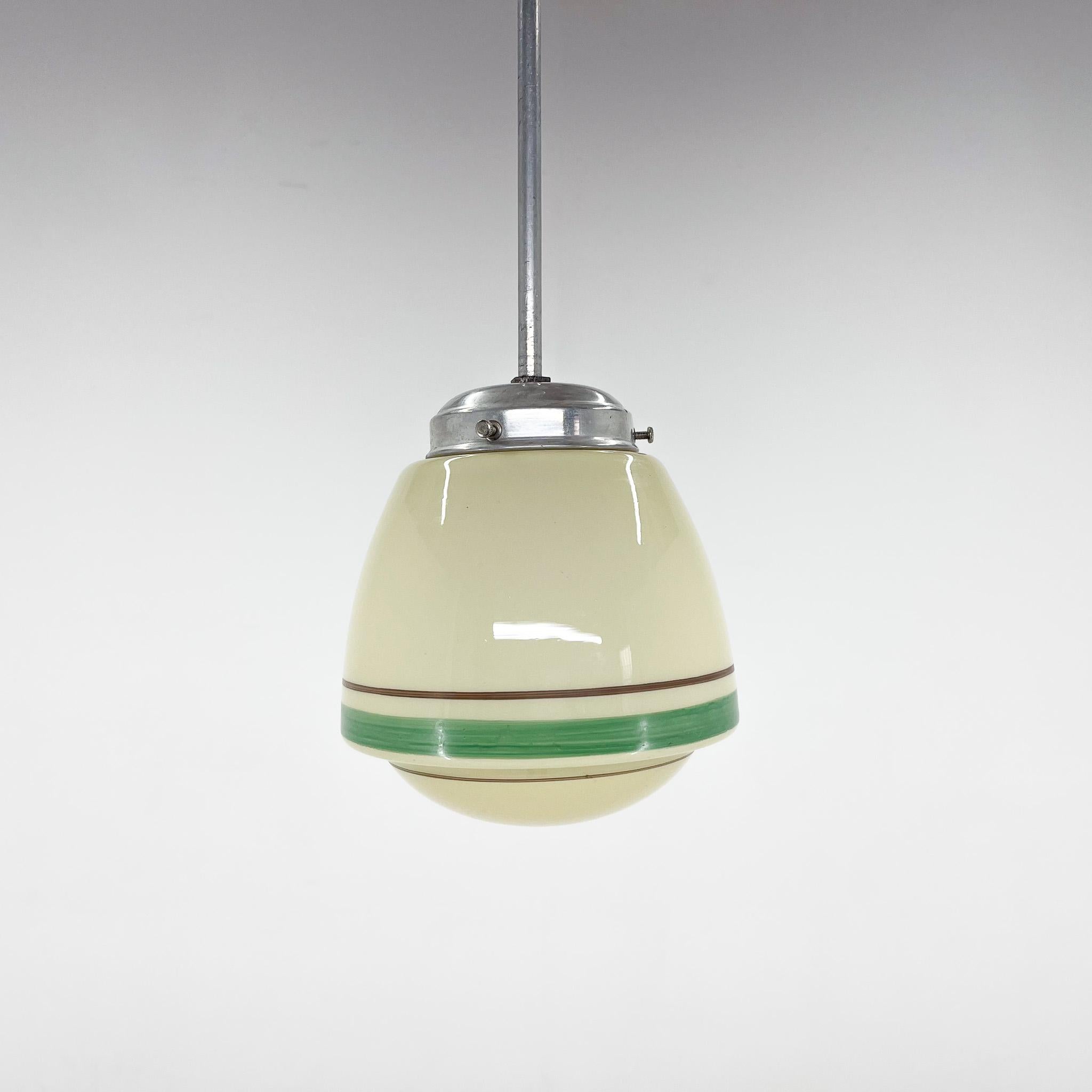 Small art deco pendant light with hand painted glass. Made in former Czechoslovakia in the 1930s.