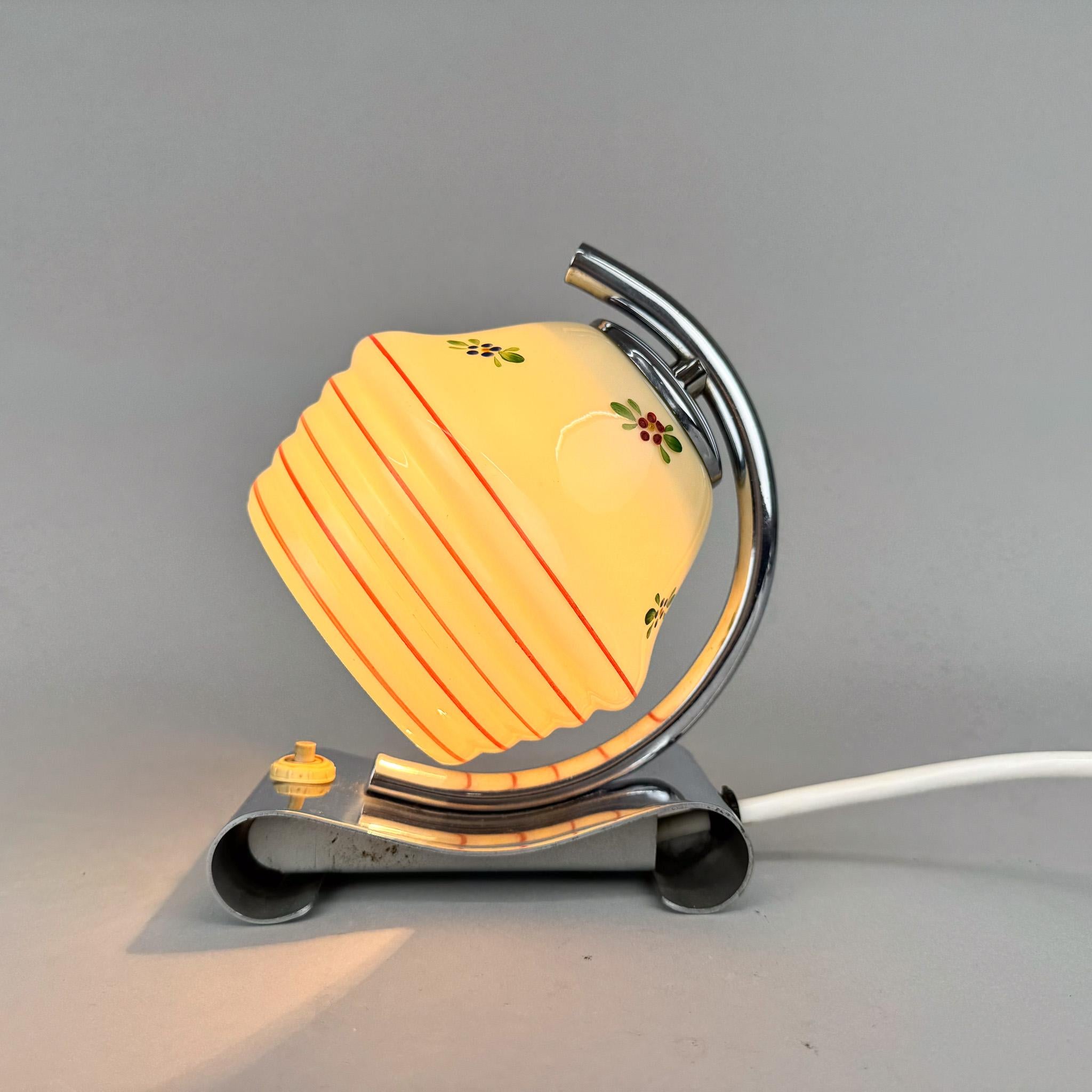 Small art deco lamp with glass hand painted lamp shade. 
Made in former Czechoslovakia. 
Bulb: 1 x E27 (E26). 
US adapter included.