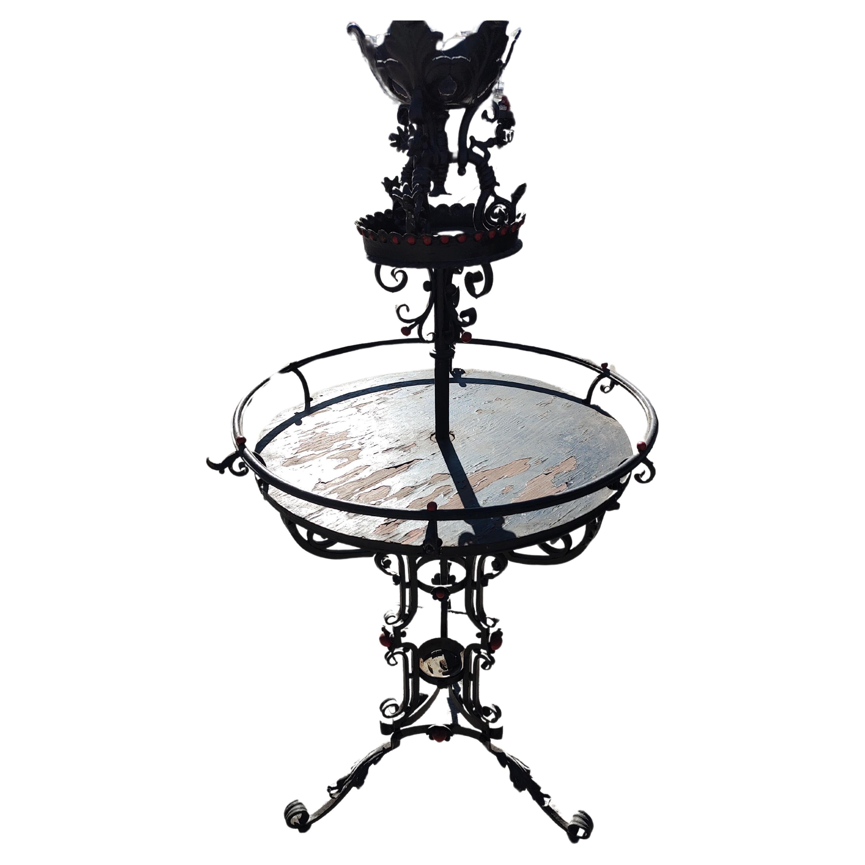 Art Deco Hand Wrought Large Two Tier Plant Stand with Ornamental pieces. en vente
