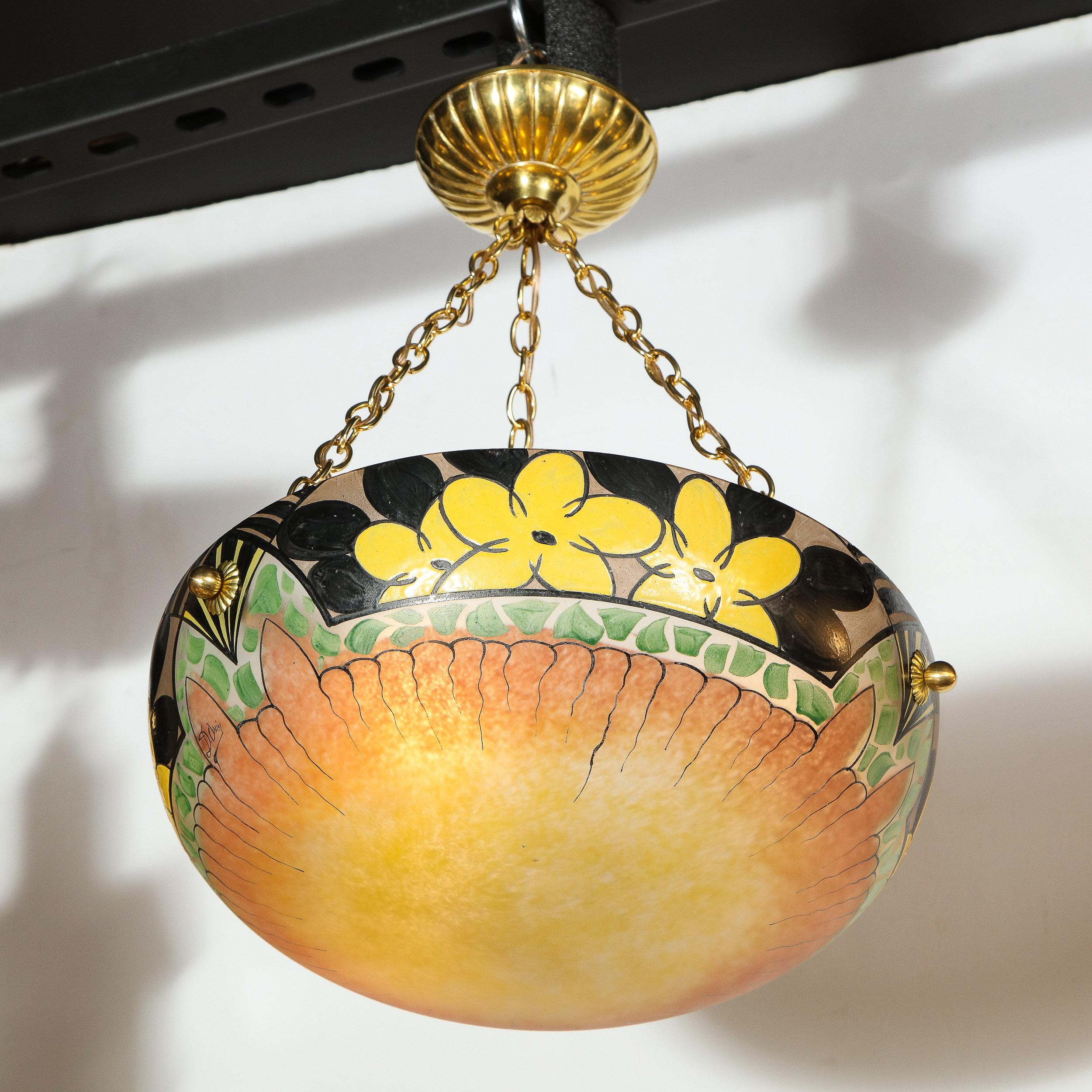 This striking Art Deco chandelier was realized by the acclaimed Pierre D'Avesne in France, circa 1930. It features a convex domed glass shade with a blush rose bottom hand painted with sinuous lines, abstract forms, and graphic stylized floral