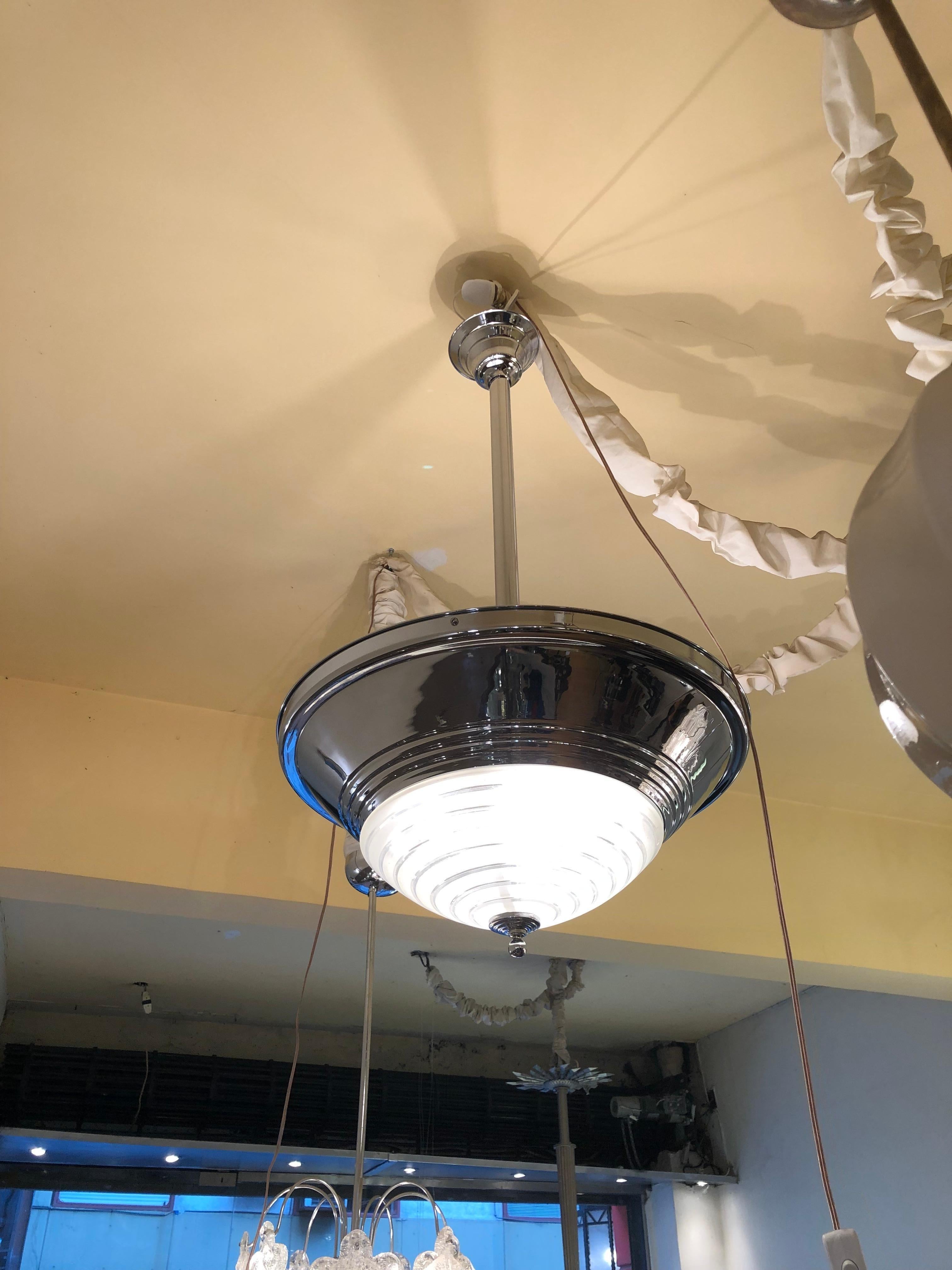 Hanging lamp

Material: chrome and glass
Style: Art Deco
Country:German
To take care of your property and the lives of our customers, the new wiring has been done.
We have specialized in the sale of Art Deco and Art Nouveau and Vintage styles since