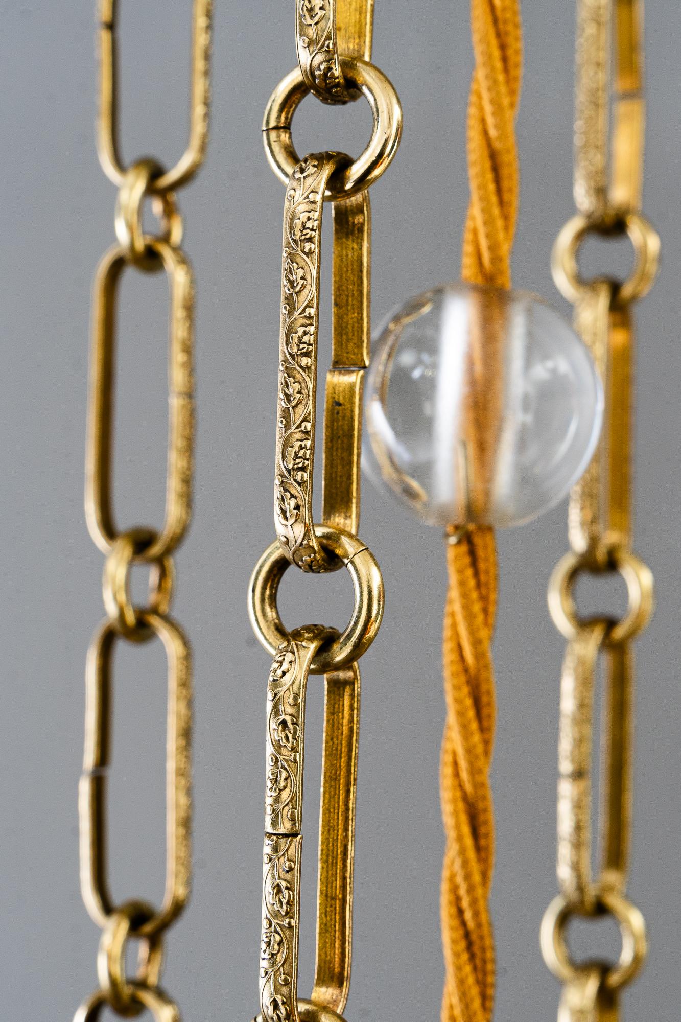 Ottone Lampada a sospensione Art Deco con bacchette in vetro di Vienna, anni '20 circa in vendita