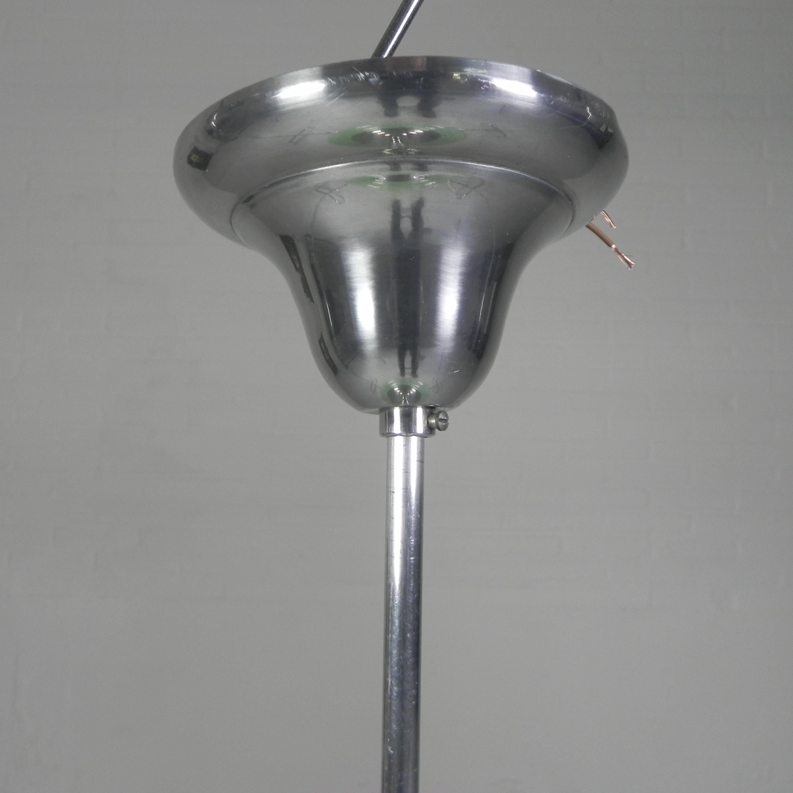 Brass Art Deco hanging lamp with green cloudy glass shade, 1930s For Sale