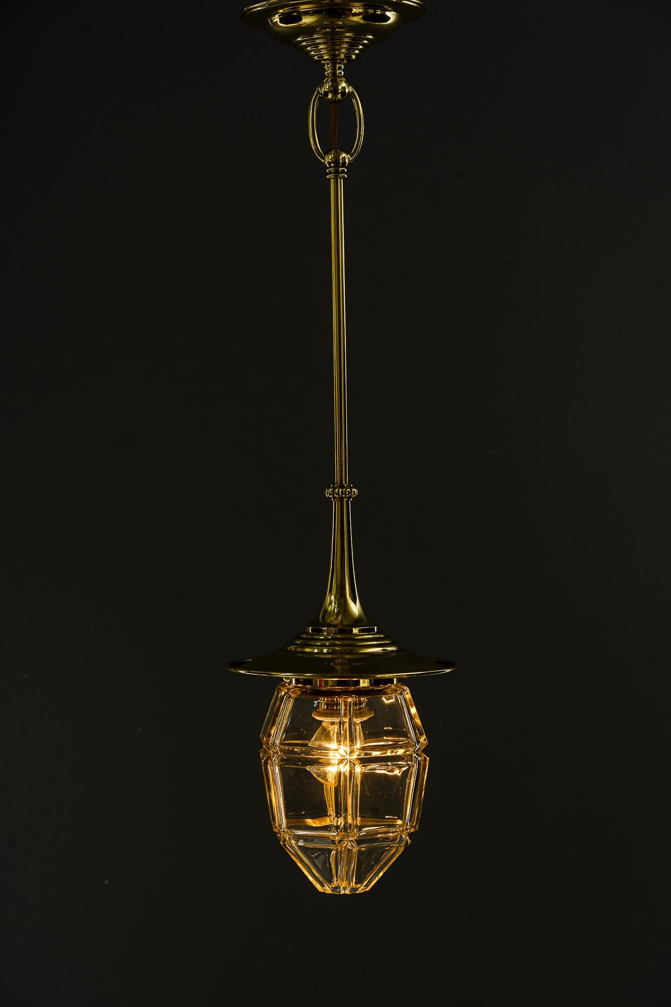 Brass Art Deco hanging lamp with original antique cut glass sahde vienna around 1920s For Sale