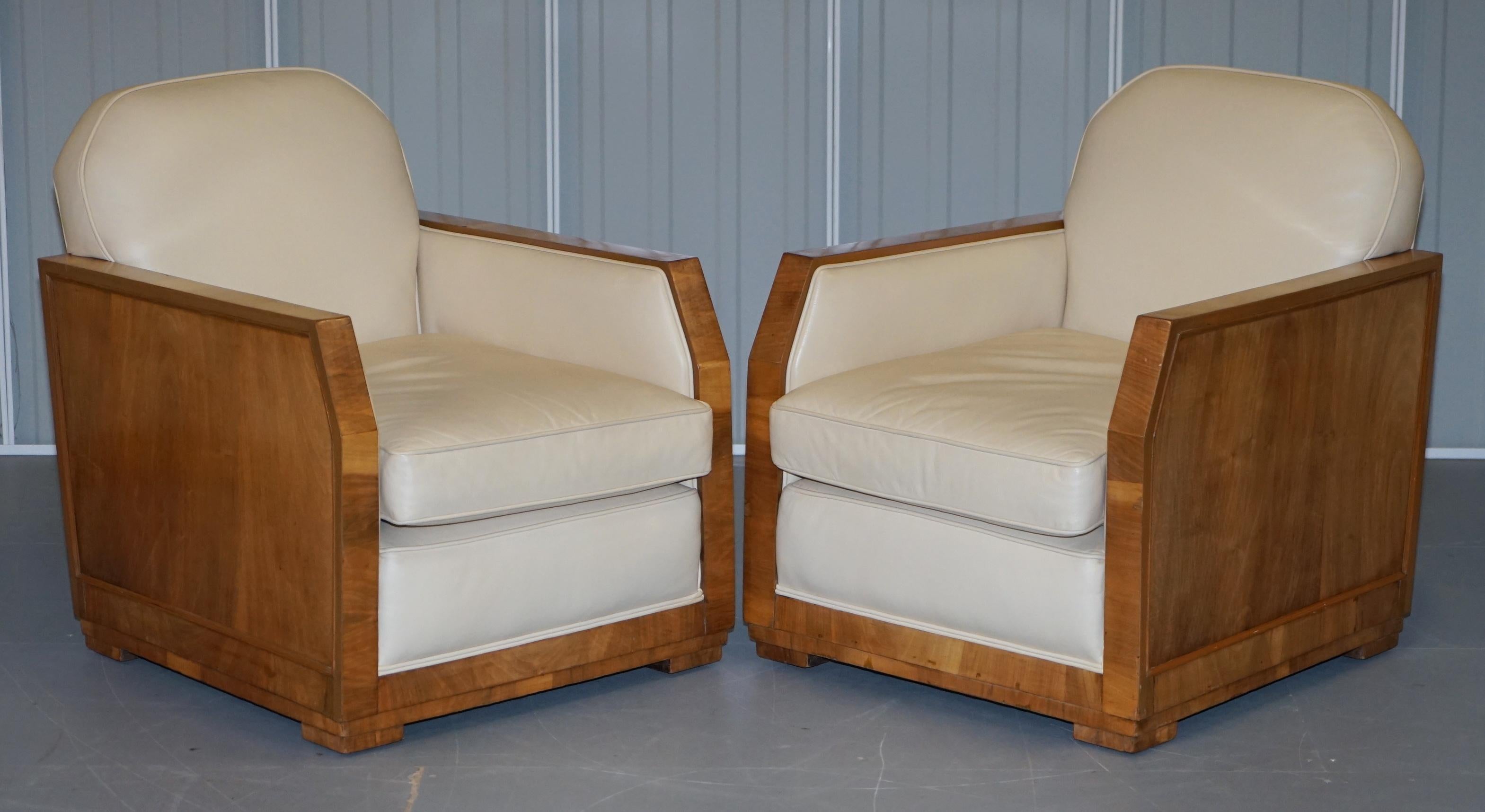 We are delighted to offer for sale this stunning and very rare Harry & Lou Epstine Art Deco three piece suite with Walnut frames and cream leather upholstery

A very stylish and decorative suite. The flamed walnut has a sublime color and is very