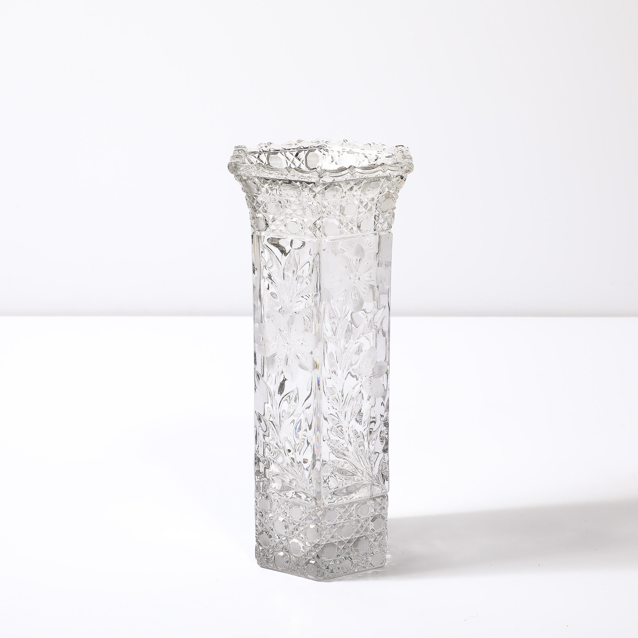 This sophisticated and beautifully fabricated Art Deco Harvard Pattern Octagonal Cut Crystal Vase W/ Floral and Geometric Detailing originates from the United States, Circa 1925. Features a wonderful transparent cut crystal rendered in the Harvard