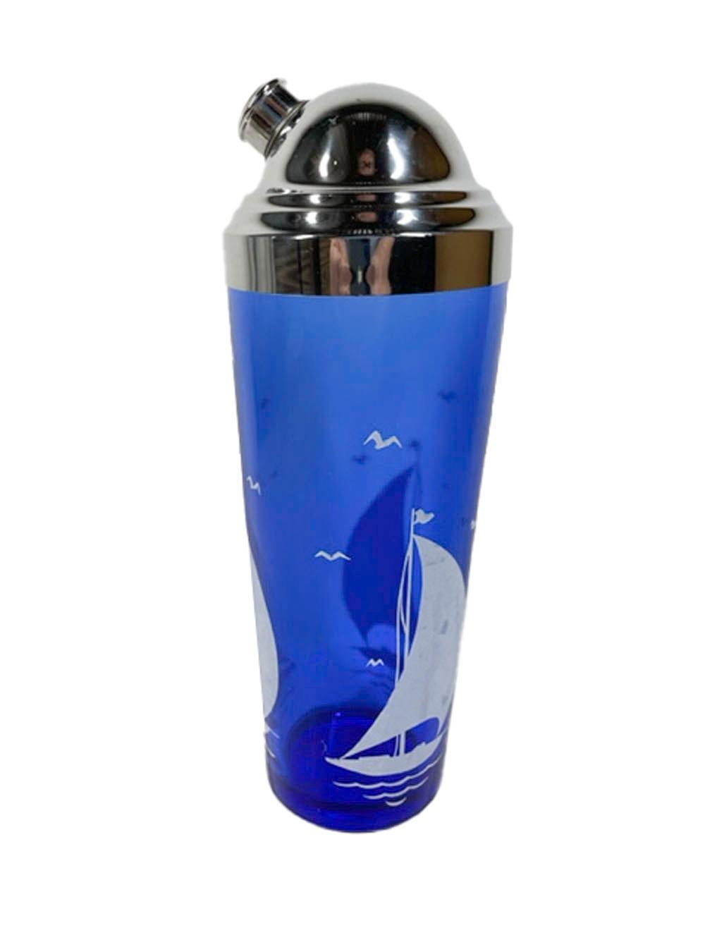 Art Deco cobalt glass cocktail shaker with white sailboats and a chrome lid from their Sportsmans Series.