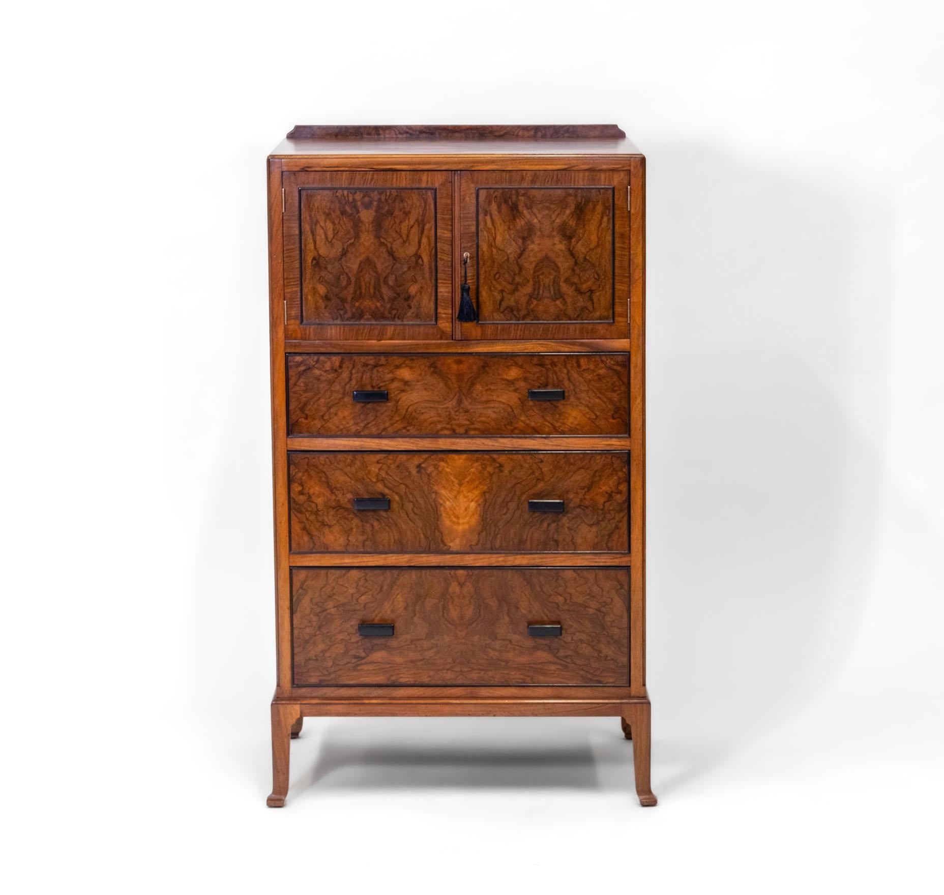 Art Deco Heals Figured Walnut Tallboy Chest Of Drawers Of Small Proportions 1930 In Good Condition For Sale In Norwich, GB