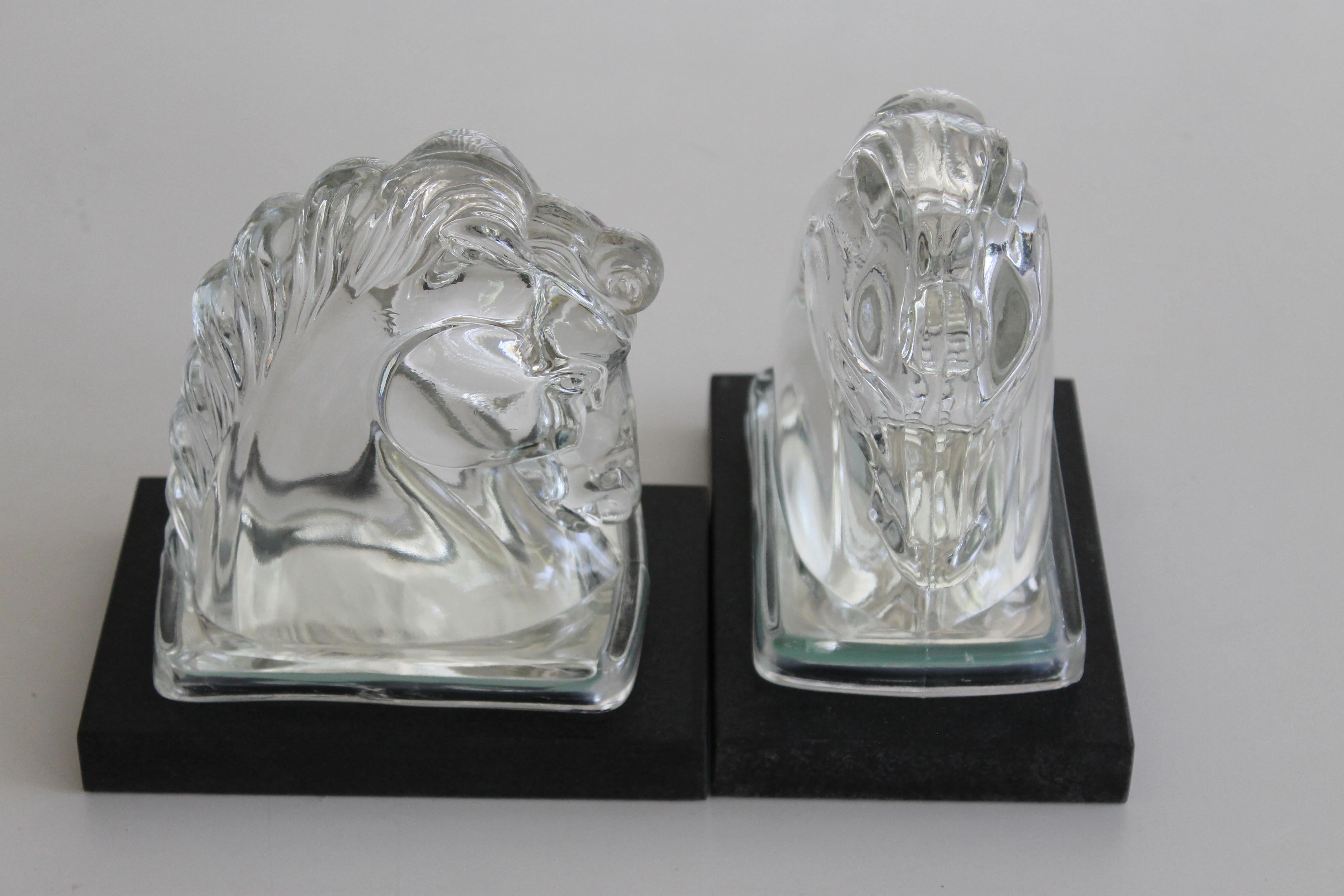 Vintage Art Deco clear glass bookends. They have been customized with mirrored inserts and black marble bases. Each measure 6