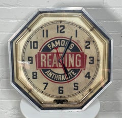 Reloj Publicitario Art Decó Hexagonal NEÓN "FAMOSA LECTURA ANTRACITA" rojo neón