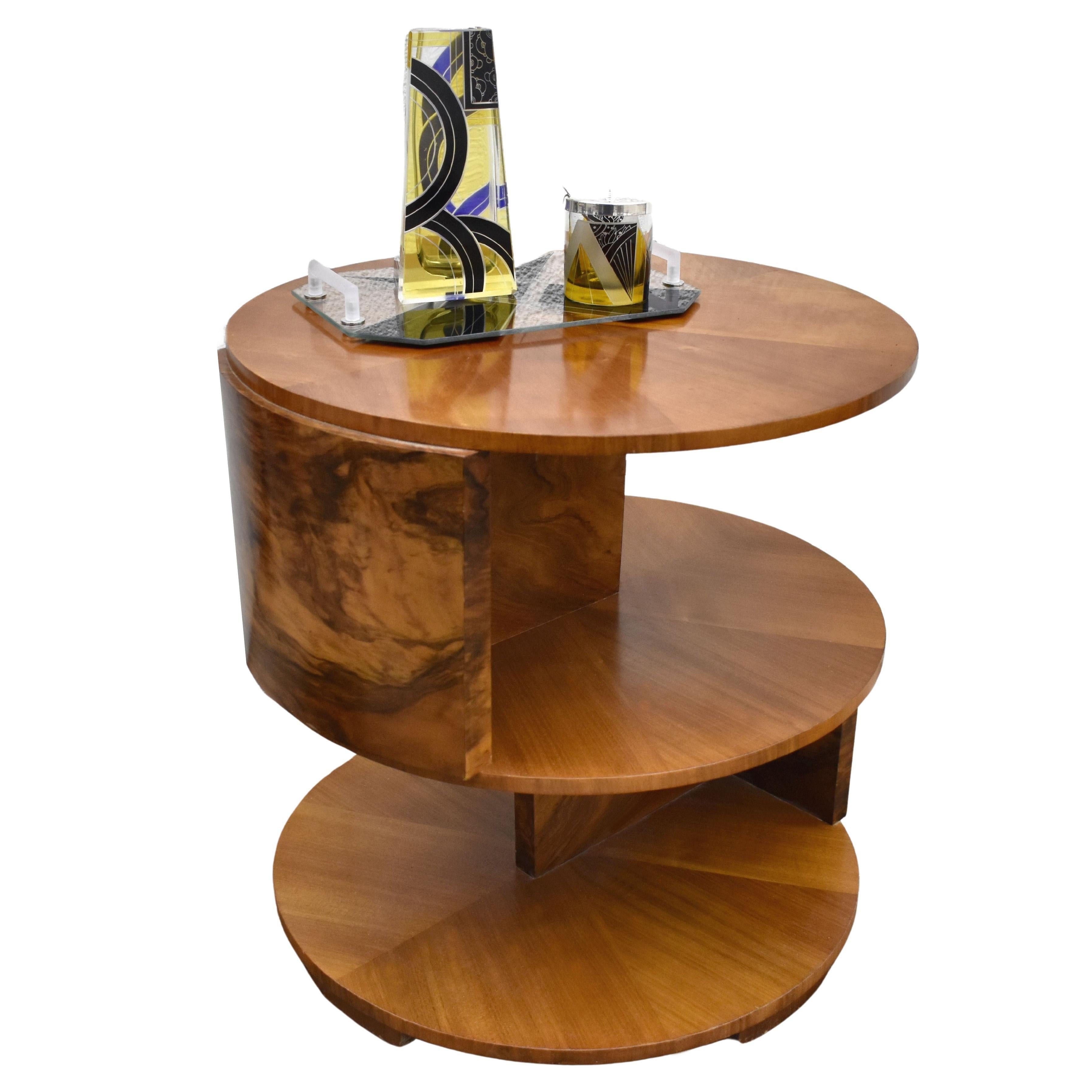 Very stylish Art Deco English Modernist table dating to the 1930s. A very fine example that can be used for multiple purposes, a centre, end, coffee table. An innovative asymmetric design sets this Art Deco occasional or book table apart from run of