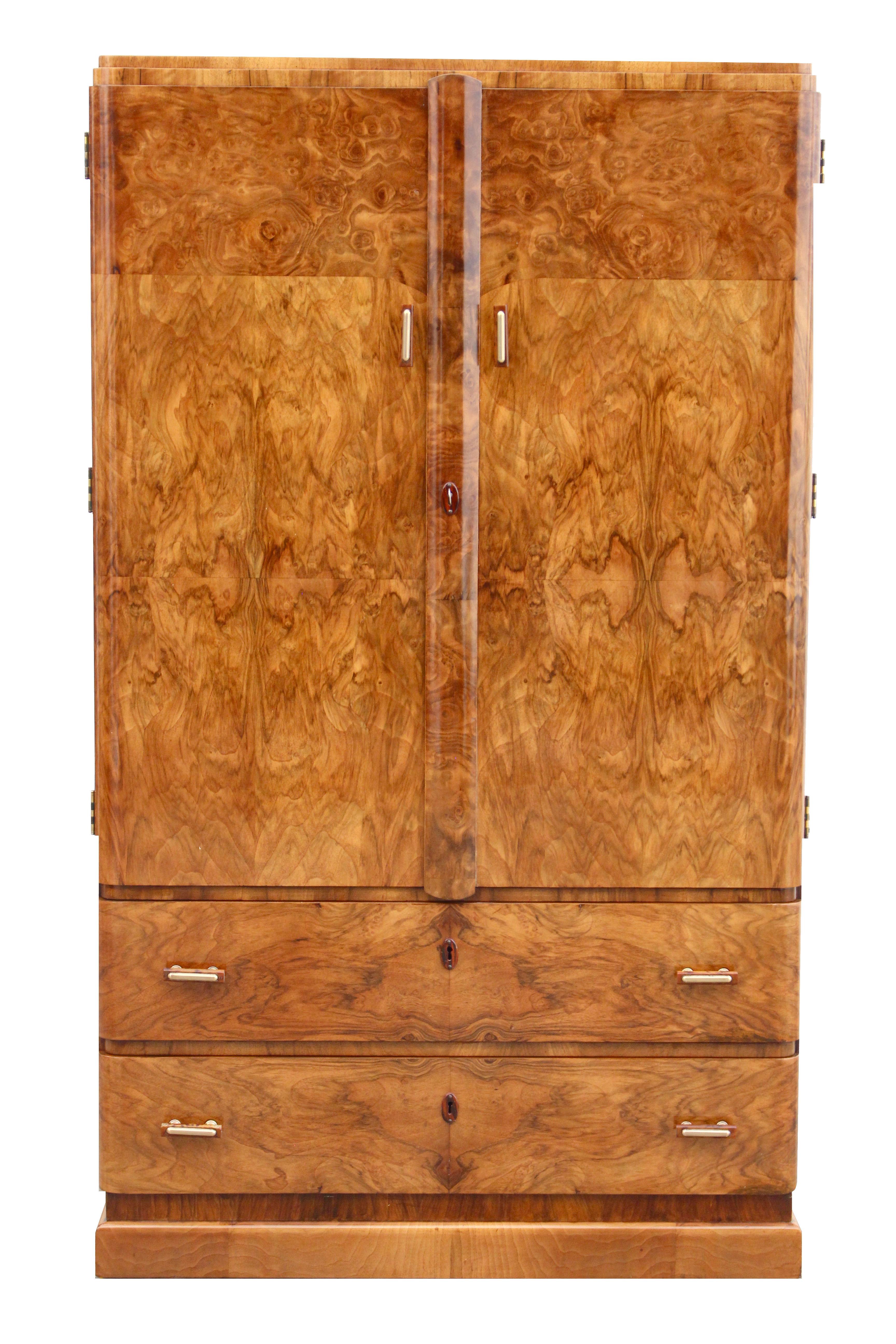 A real treasure from the 1930s is this Art Deco tallboy. On first viewing this piece one can't not be impressed by the obvious quality and size, made from solid mahogany for the carcass with a heavily figured walnut book paged veneers to the