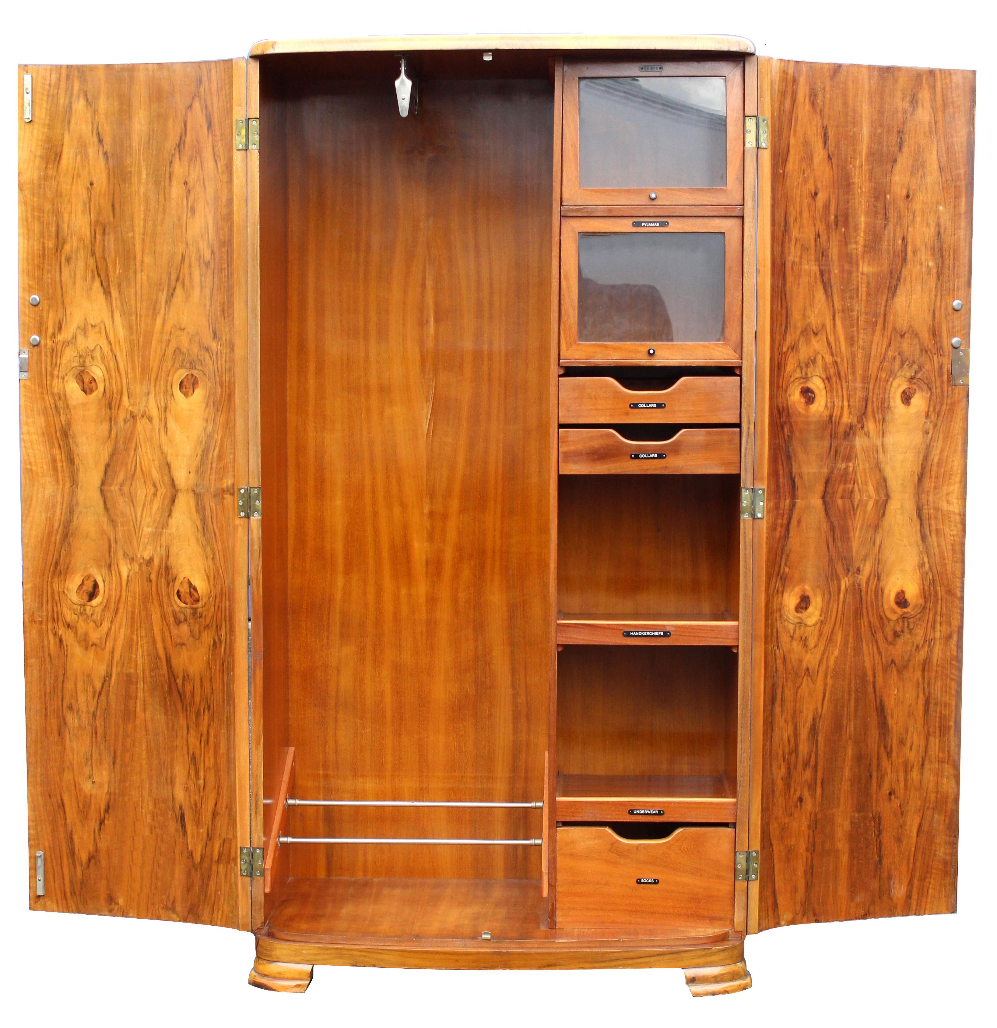 For your consideration is this beautiful and very impressive Art Deco bow fronted single wardrobe. Not only does it look amazing but it comes with all the bells and whistles too, the interior being fully fitted. The inside doors and the top are all
