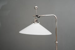 Art deco hight adjustable and swiveling nickel floor lamp with opal glass shade