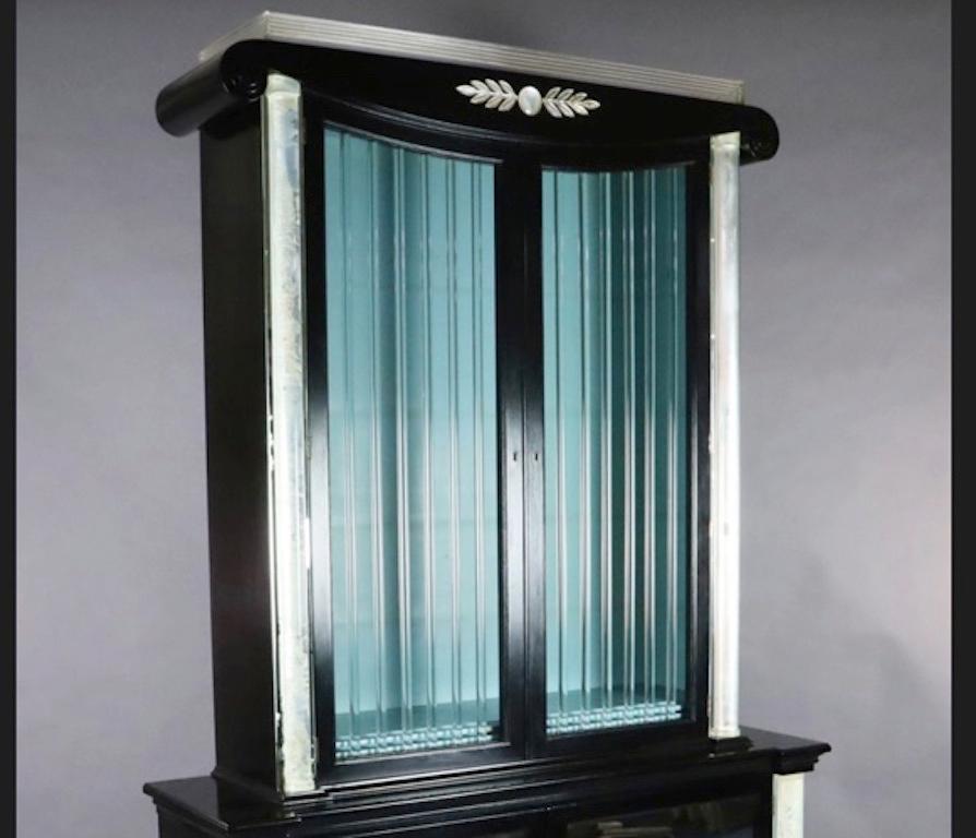 Stunning American Art Deco, Hollywood Regency
Grosfeld House Furniture Company Lucite and ebonized display cabinet.
It is very rare and even more so as it is in its original condition.

Designed by Lorin Jackson and has Perspex barred doors