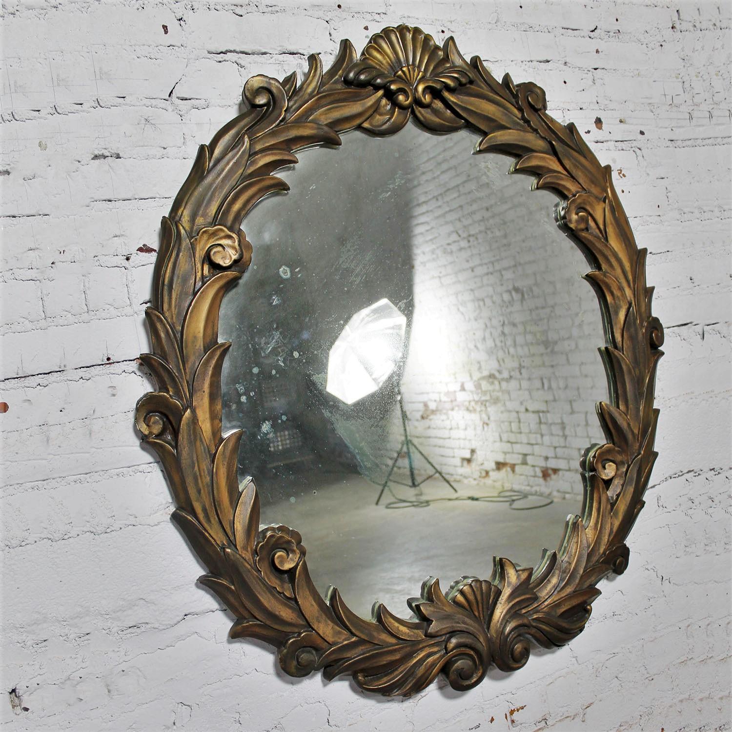 Fabulous Antique Art Deco Hollywood Regency Neo Classic Revival style foliate large scale round plaster mirror in the style of Serge Roche. Beautiful condition, keeping in mind that this is vintage and not new so will have signs of use and wear even
