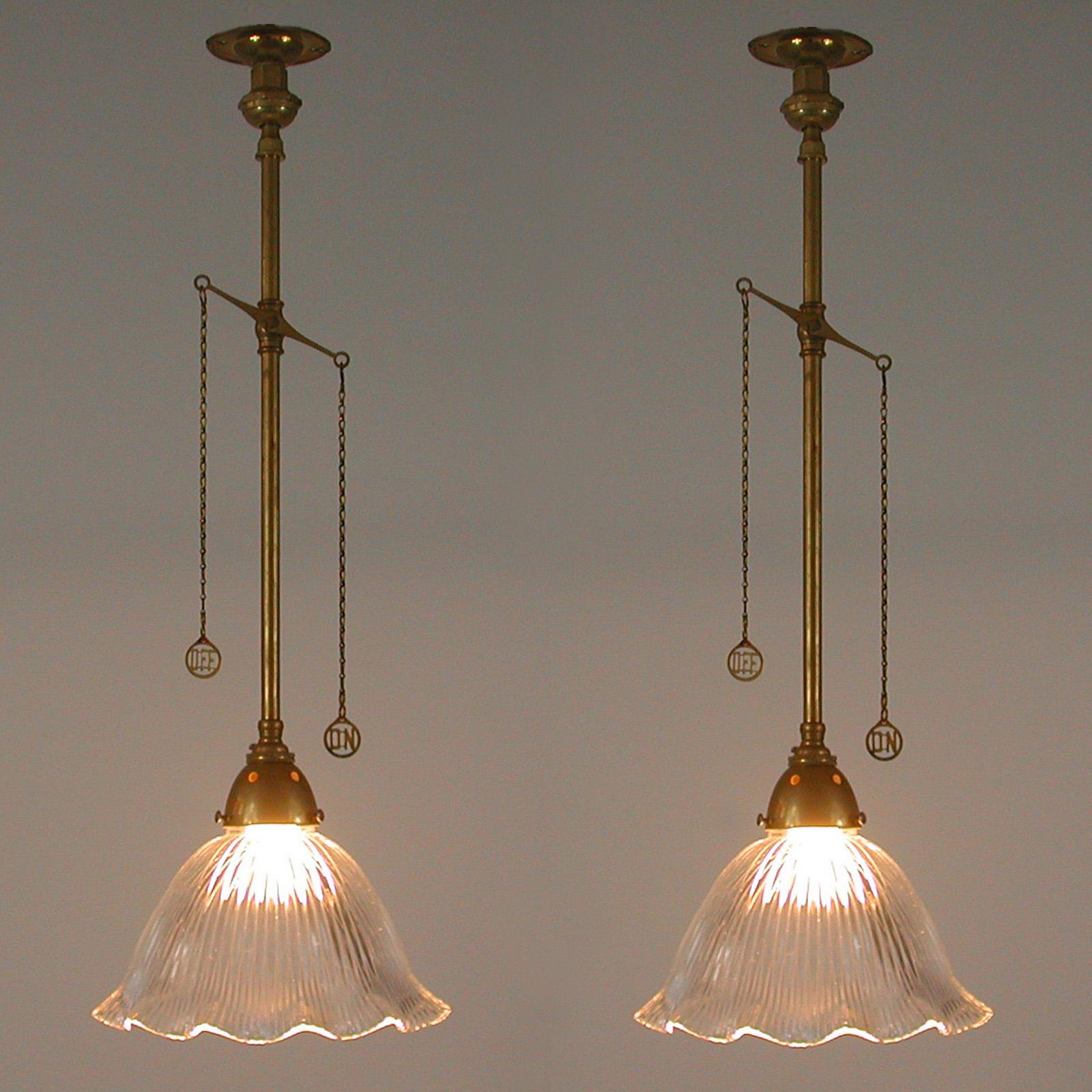 Art Deco Holophane Glass and Aged Brass Pendants, 1920s, Set of Two In Good Condition For Sale In NUEMBRECHT, NRW