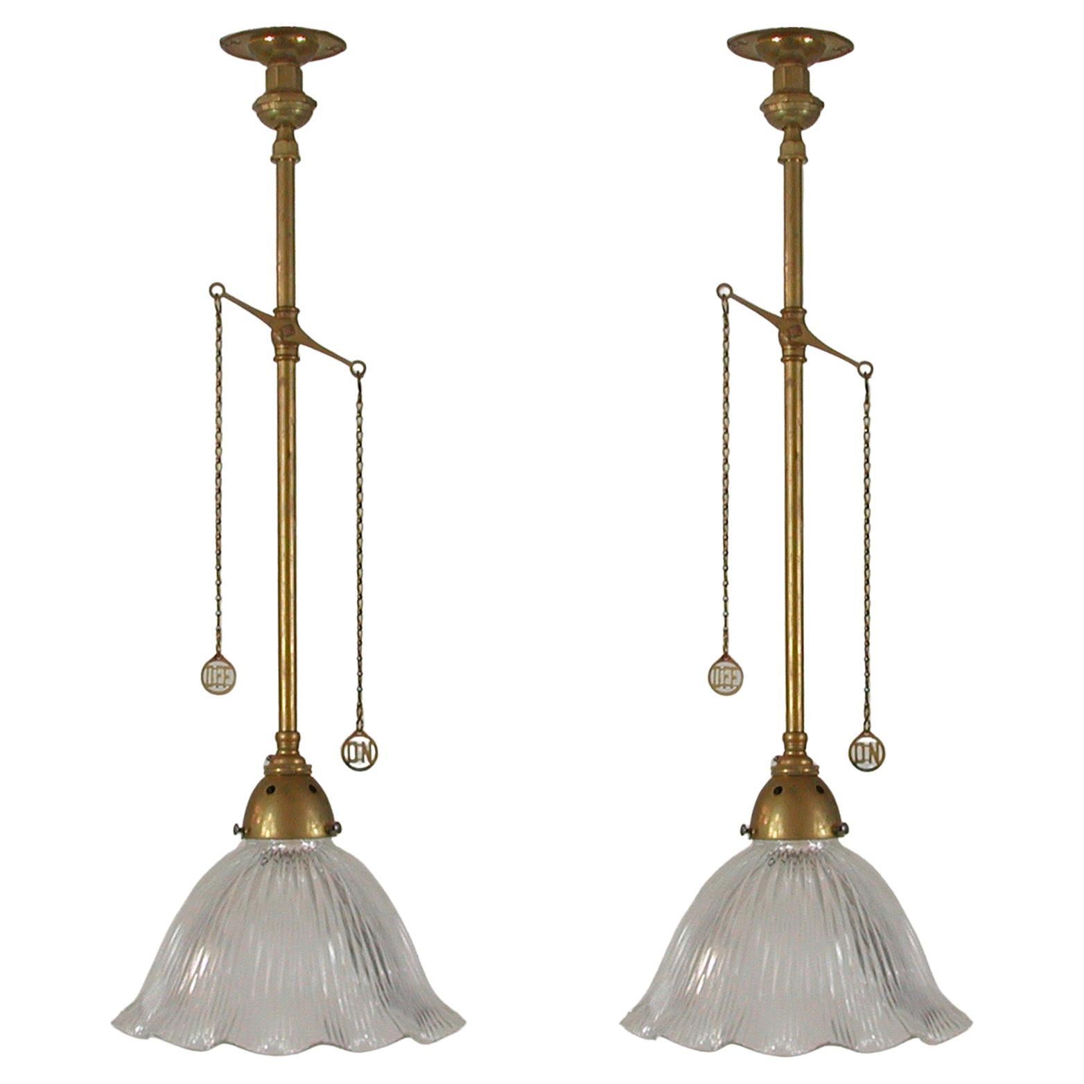 Art Deco Holophane Glass and Aged Brass Pendants, 1920s, Set of Two
