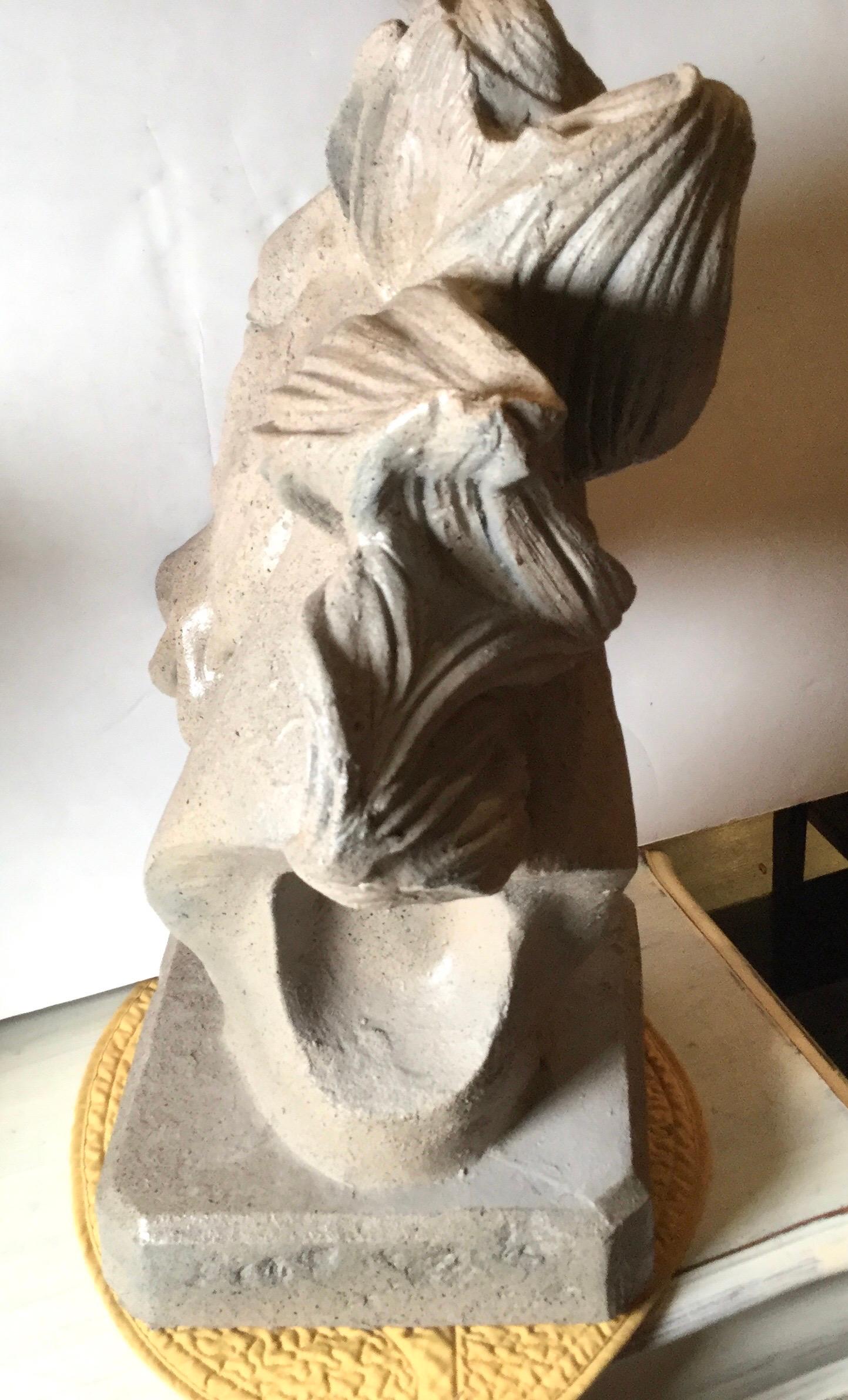 concrete horse head statue
