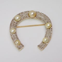 Broche fer à cheval Art déco avec perles et diamants