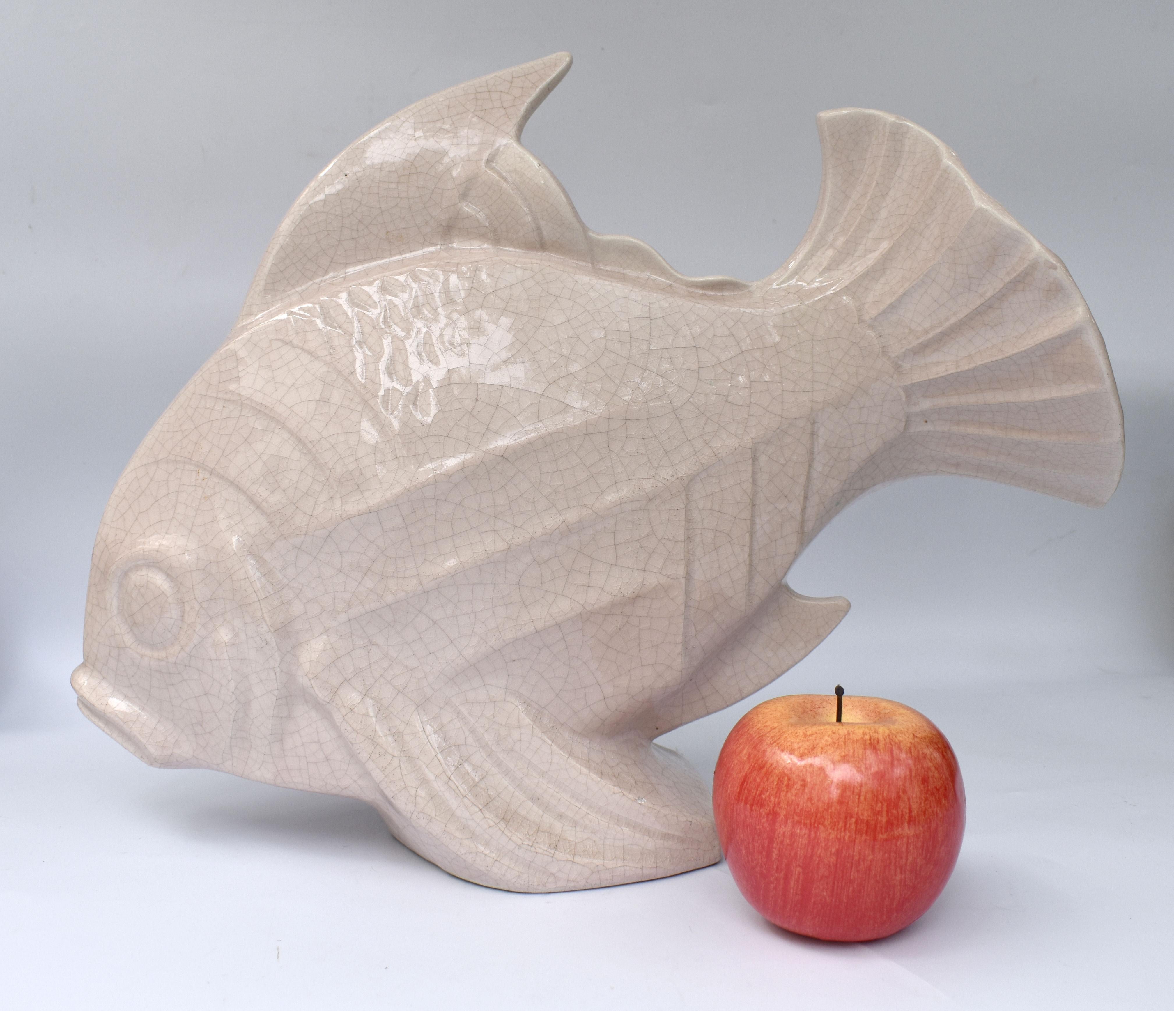 For your consideration is this huge Art Deco ceramic fish with a crackle glaze finish originating from France and Art signed LEJAN to bottom fin and dating to the 1930's. This really is a monster size ( see dimensions below) and looks superb in