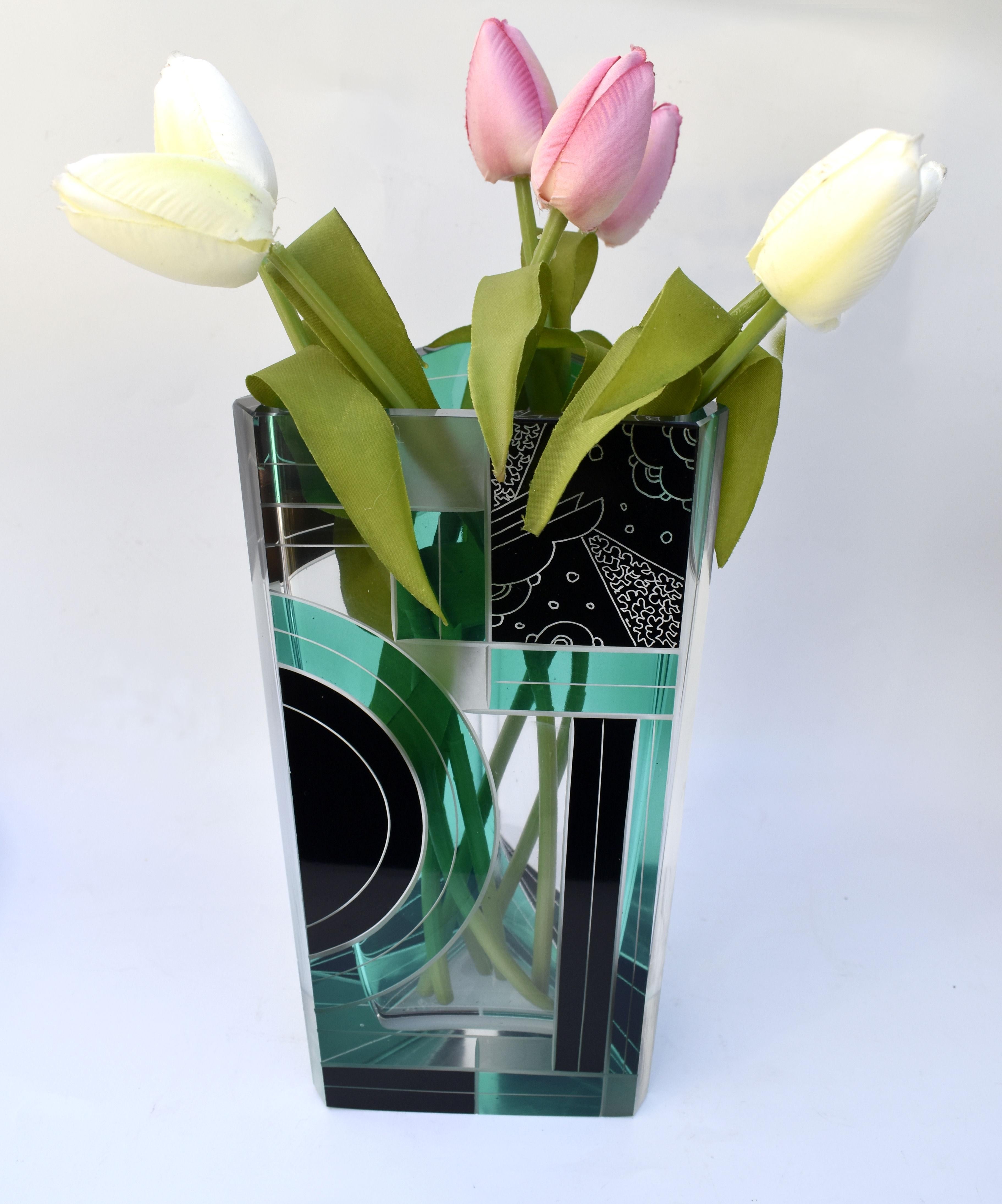 Originating from Czech republic this Art Deco vase not only visually looks stunning with it's very distinctive colourway and patterning but is a great size standing just over 25 cm. The glass is extremely thick and therefore the vase itself is