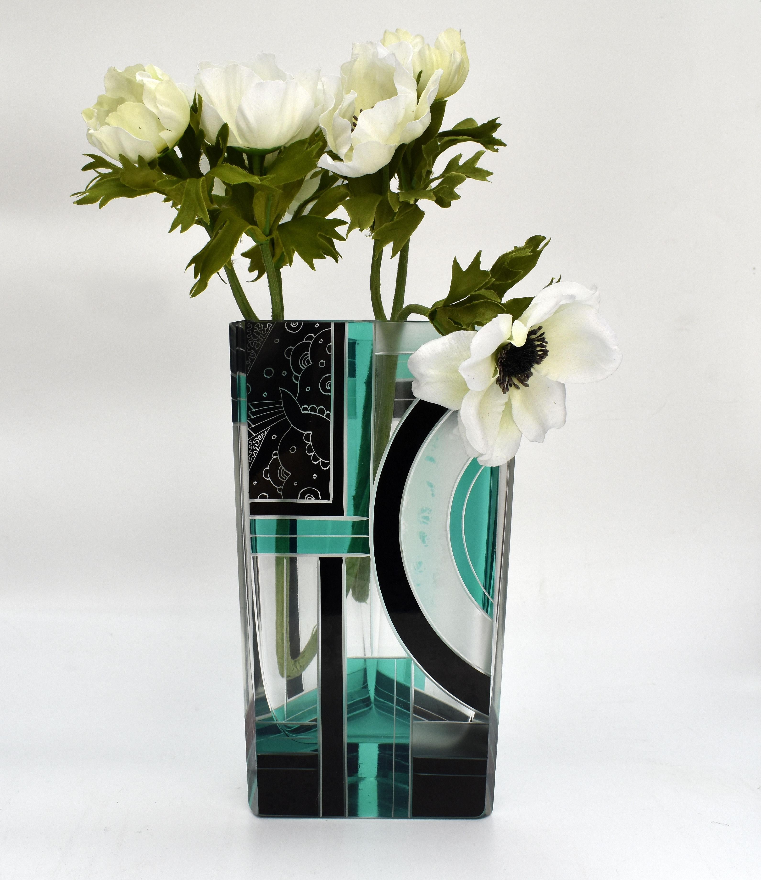 Originating from Czech republic this Art Deco vase not only visually looks stunning with it's very distinctive colourway and patterning but is a great size standing approximately 24 cm. The glass is extremely thick and therefore the vase itself is