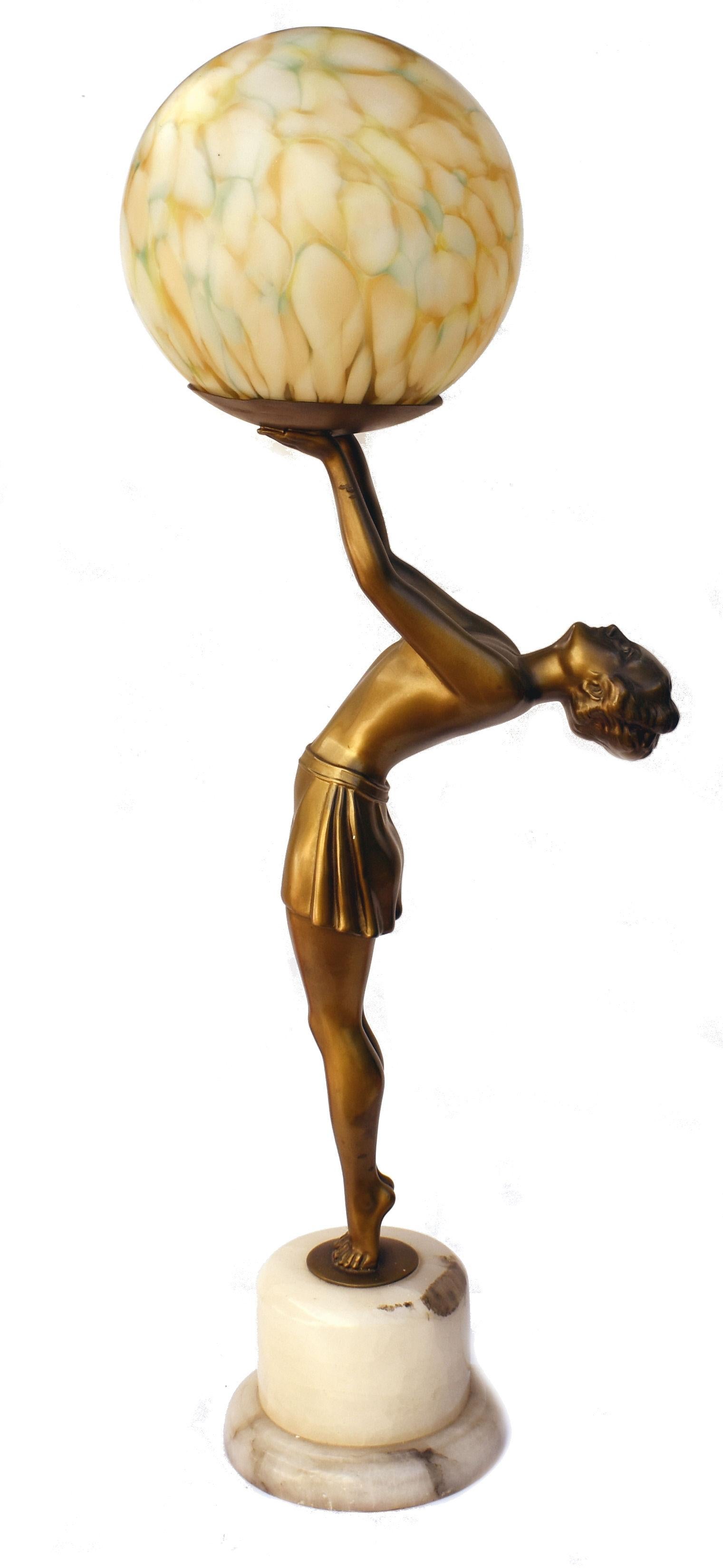 Standing almost 60cm tall is this genuinely beautiful spelter lady lamp. circa 1930, France, the spelter cold-painted in gold, tints of red and brown mounted on an alabaster base holding aloft an original glass globe. Made by Enrique Molins-Balleste
