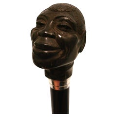 Art Decó Humorístico Retrato de Hombre Negro Escultura de Ébano Bastón Bastón.