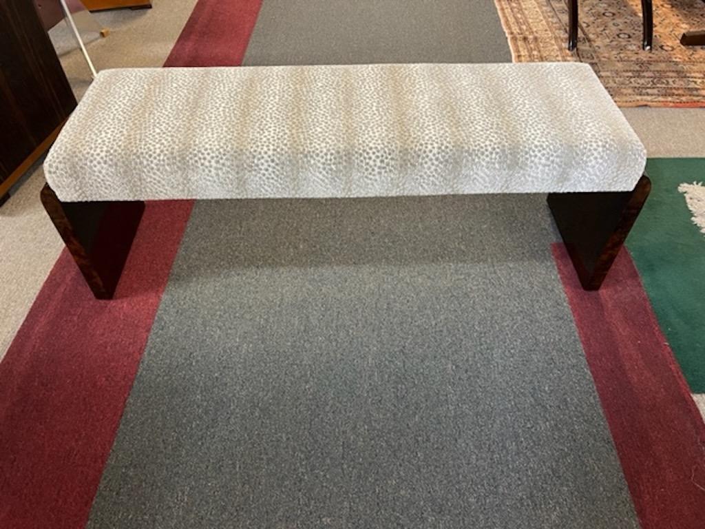 Very comfortable bench is made out of walnut wood, re-upholstered with light grey dotted velvety fabric. Bench is resting on two wooden prominent legs. 

Condition is perfect, restored
Hungary, c. 1940s
Measures: 52” W x 16” D x 18” H.
 