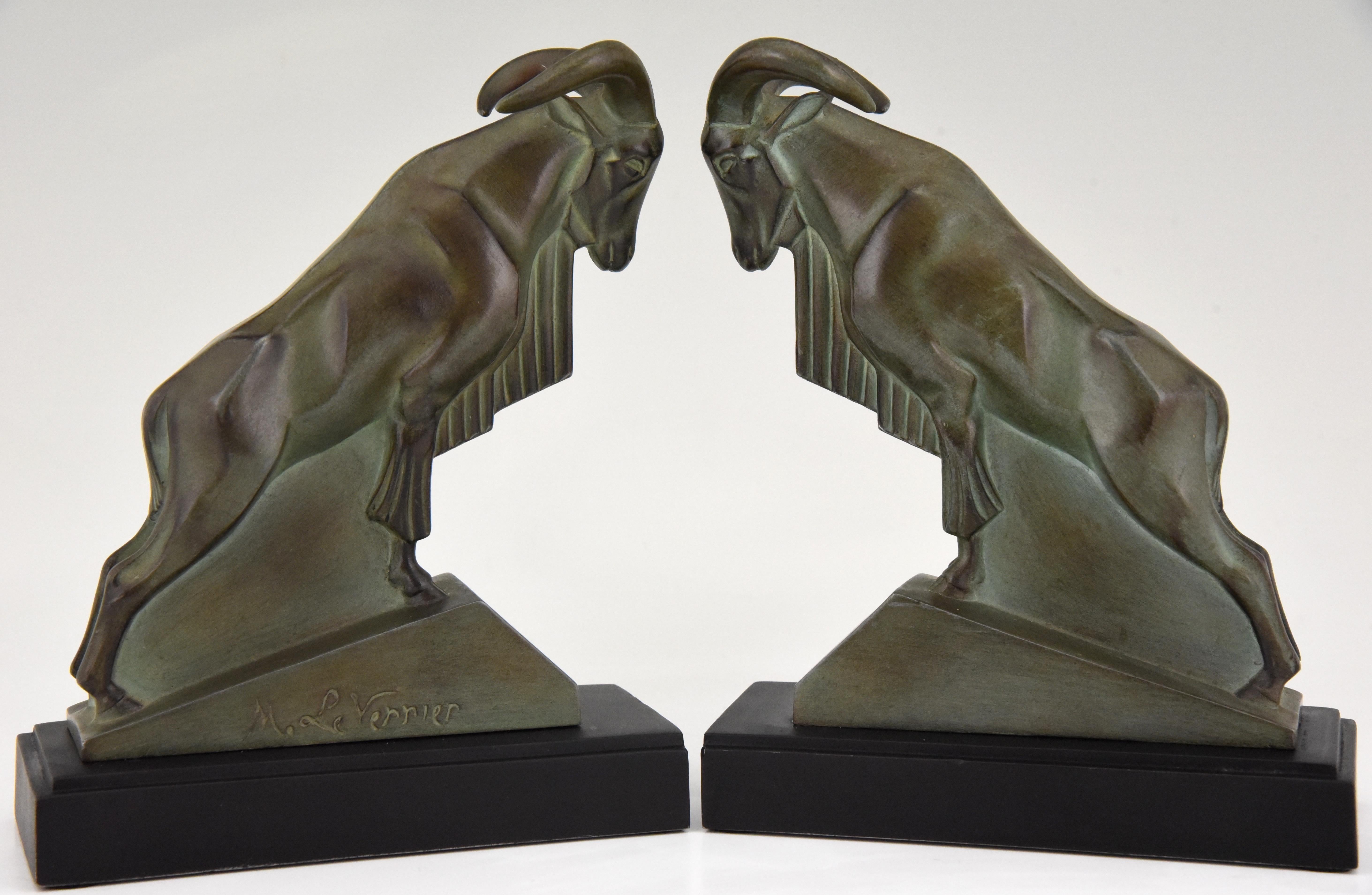 Stylish Art Deco Ibex or Ram bookends, signed by the well know sculptor Max Le Verrier with lovely green patina. The bookends are mounted on a Black metal base. France 1930.
Literature:
“Art Deco sculpture” by Victor Arwas, Academy. “Bronzes,