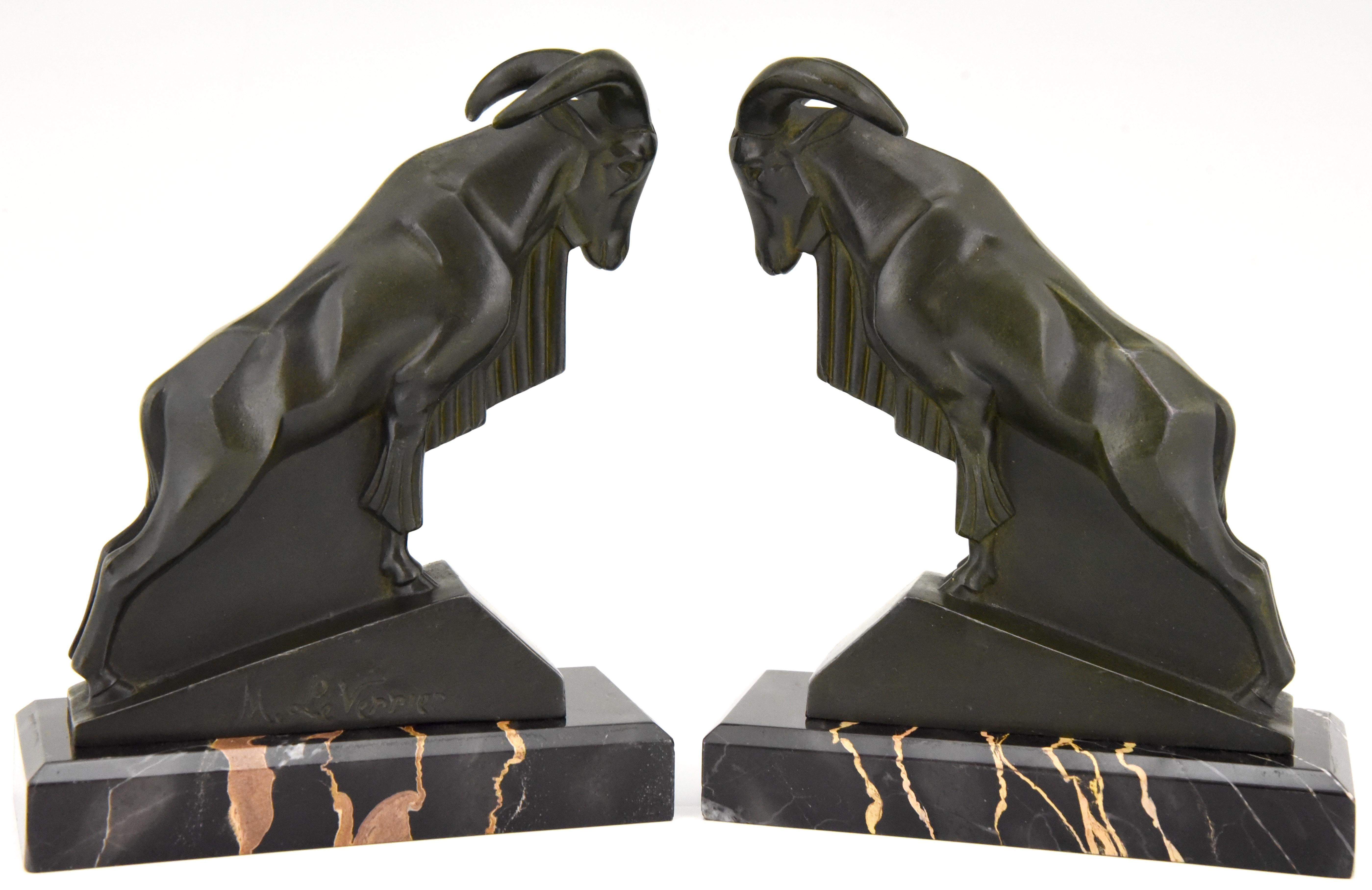 Stylish Art Deco Ibex or Ram bookends, signed by the well know sculptor Max Le Verrier with lovely green patina. The bookends are mounted on portor marble bases, France, 1930.
They were a birthday gift: Written text and date 13-5-1928.
“Happy