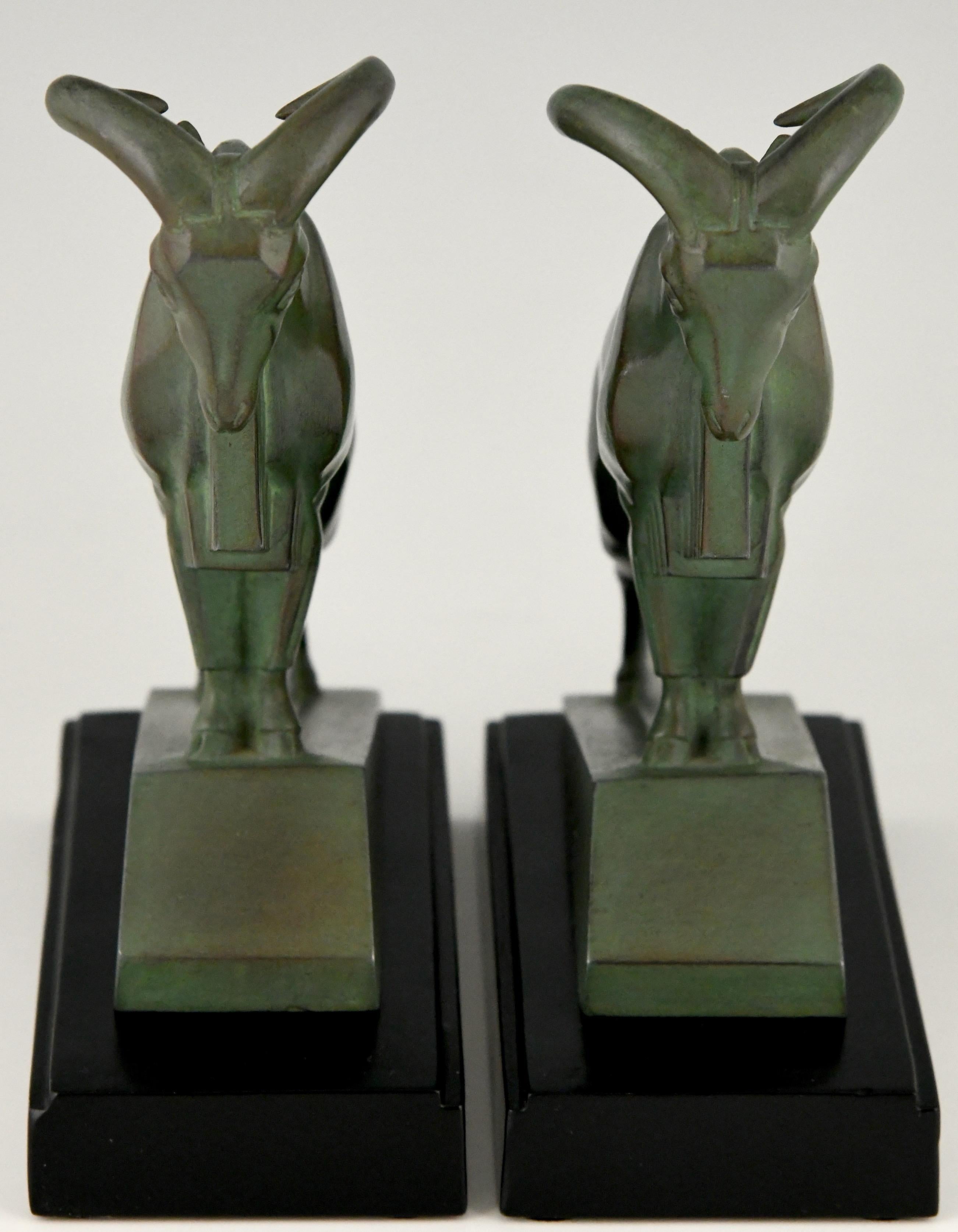 Patinated Art Deco Ibex or Ram Bookends Signed by the Sculptor Max Le Verrier France, 1930 For Sale