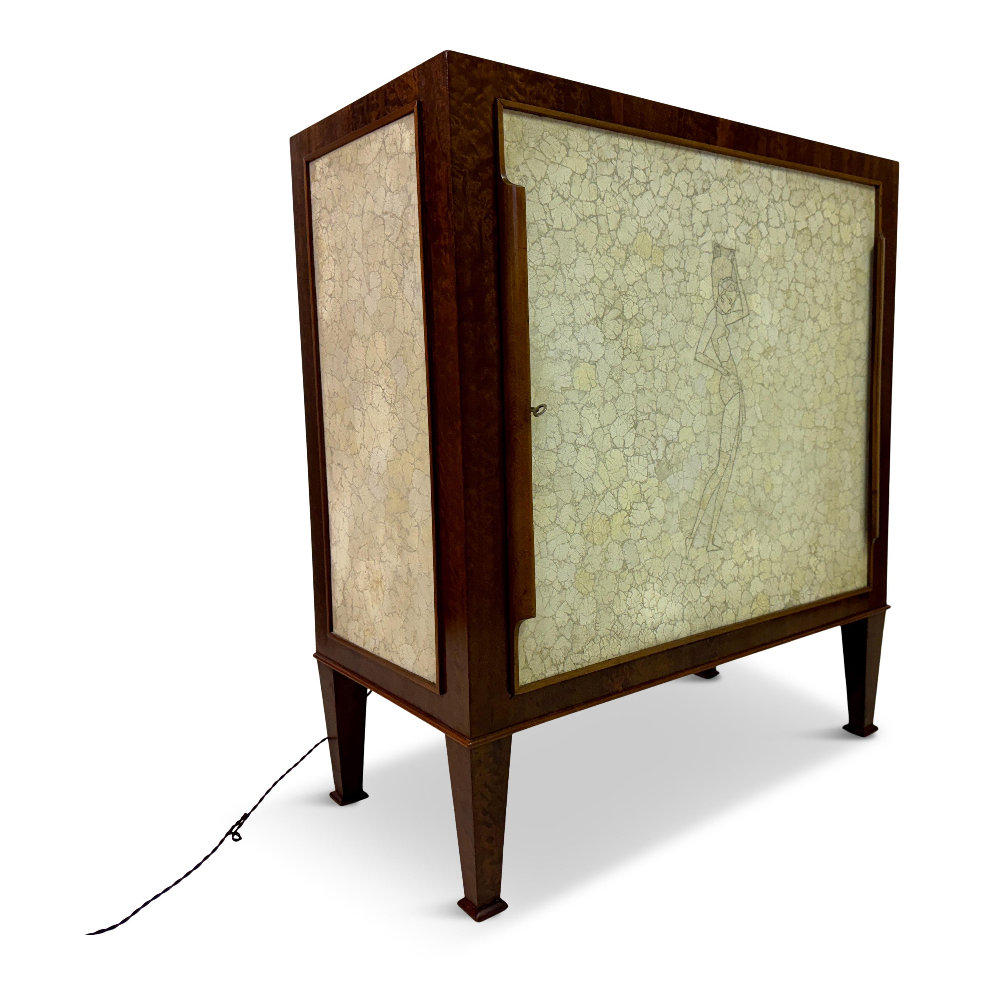 Aldo Tura Eggshell Cocktail Cabinet, Italy, 1930s/1940s

A rare and sophisticated cocktail cabinet by Aldo Tura, crafted in Milan in the 1930s/1940s. The cabinet’s standout feature is its front and side panels, meticulously inlaid with a mosaic of