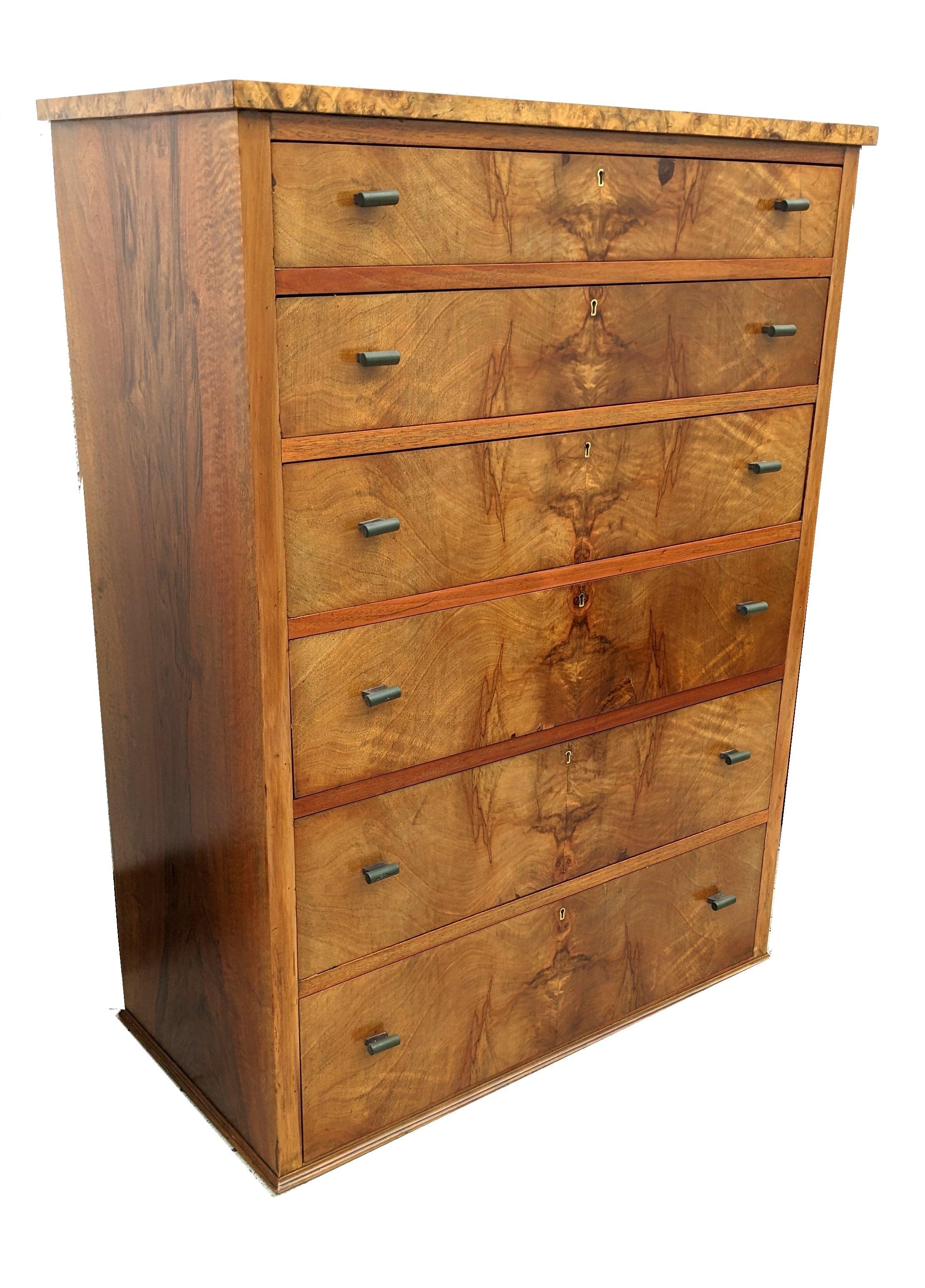 For your consideration is this very stylish and beautifully figured Walnut original Art Deco chest of drawers which dates to the 1930's. Six graduated generously sized drawers which are veneered in a warm mid tone figured walnut veneer with original