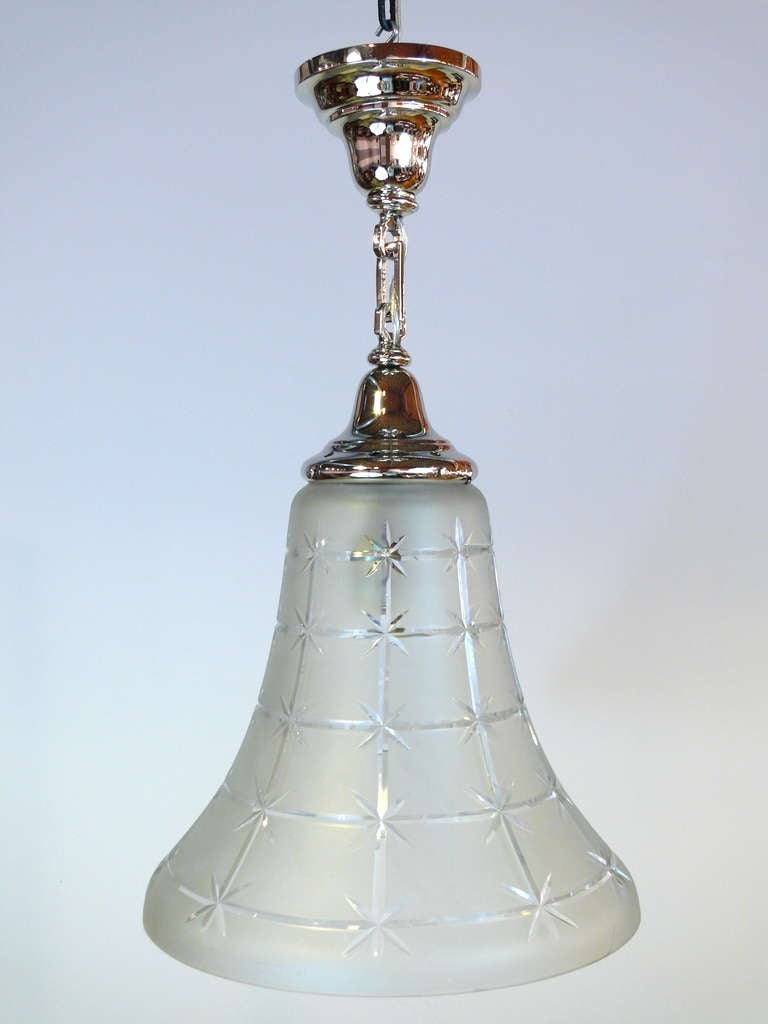Large scale bell shaped chandelier with stars Incised into the glass, circa 1930. Nickel-plated and rewired, has two sockets.