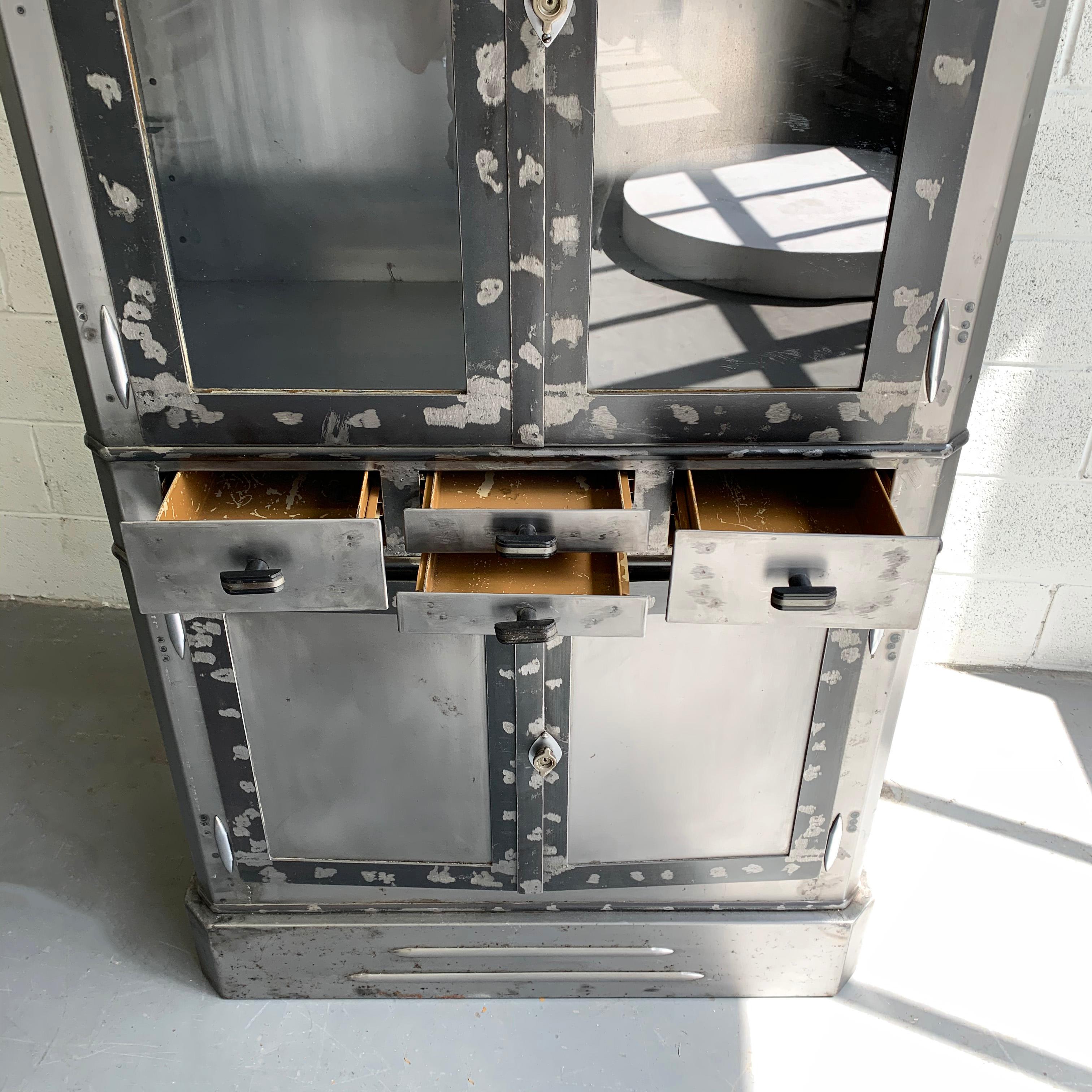 Art Deco Industrial Brushed Steel Apothecary Display Cabinet In Good Condition For Sale In Brooklyn, NY