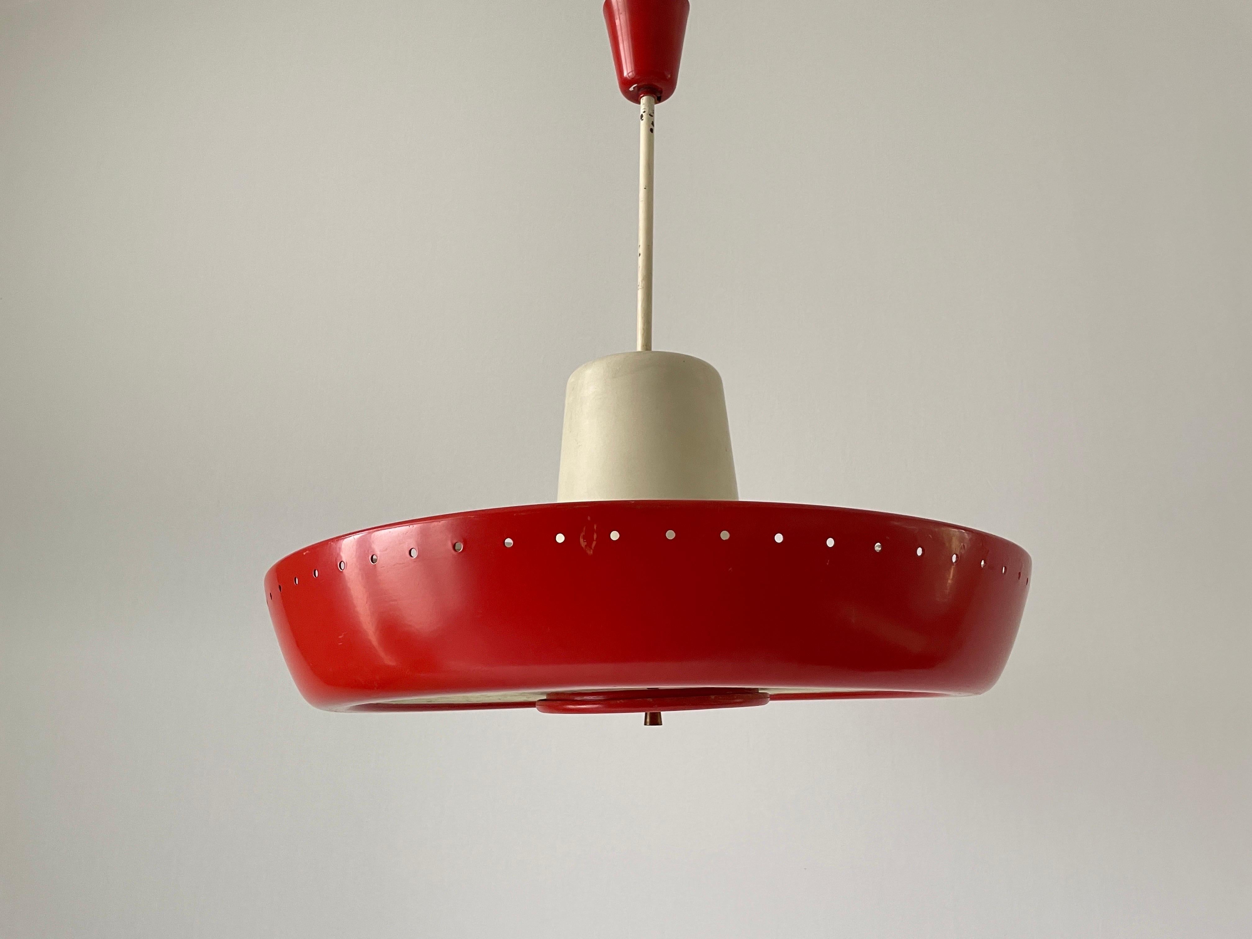 Art Deco Industrial Cinema Ceiling Lamp, 1940s, Germany

Industrial ceiling lamp with 2 fluorescents circular.  

Lampshade is in very good vintage condition.
Original canopy.

This lamp works with 12 fluorescents. (30 cm and 35 cm diameter)
Wired