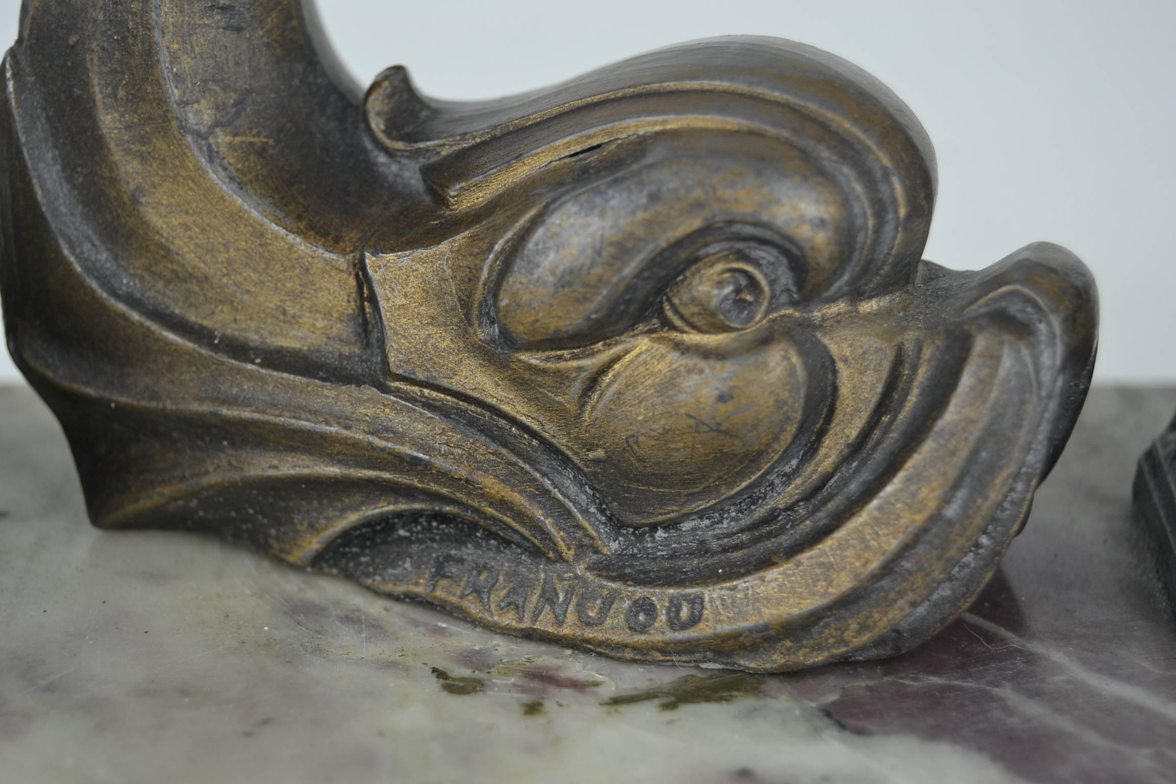 Elegant Art Deco inkwell, desk set, desk ornament, desk accessory.
Bronze patinated metal dolphin fish and two ink bottles - ink reservoir on venous marble base.
Signed: Franjou.
France
circa 1925-1930.

No glass inkwells in the Ink