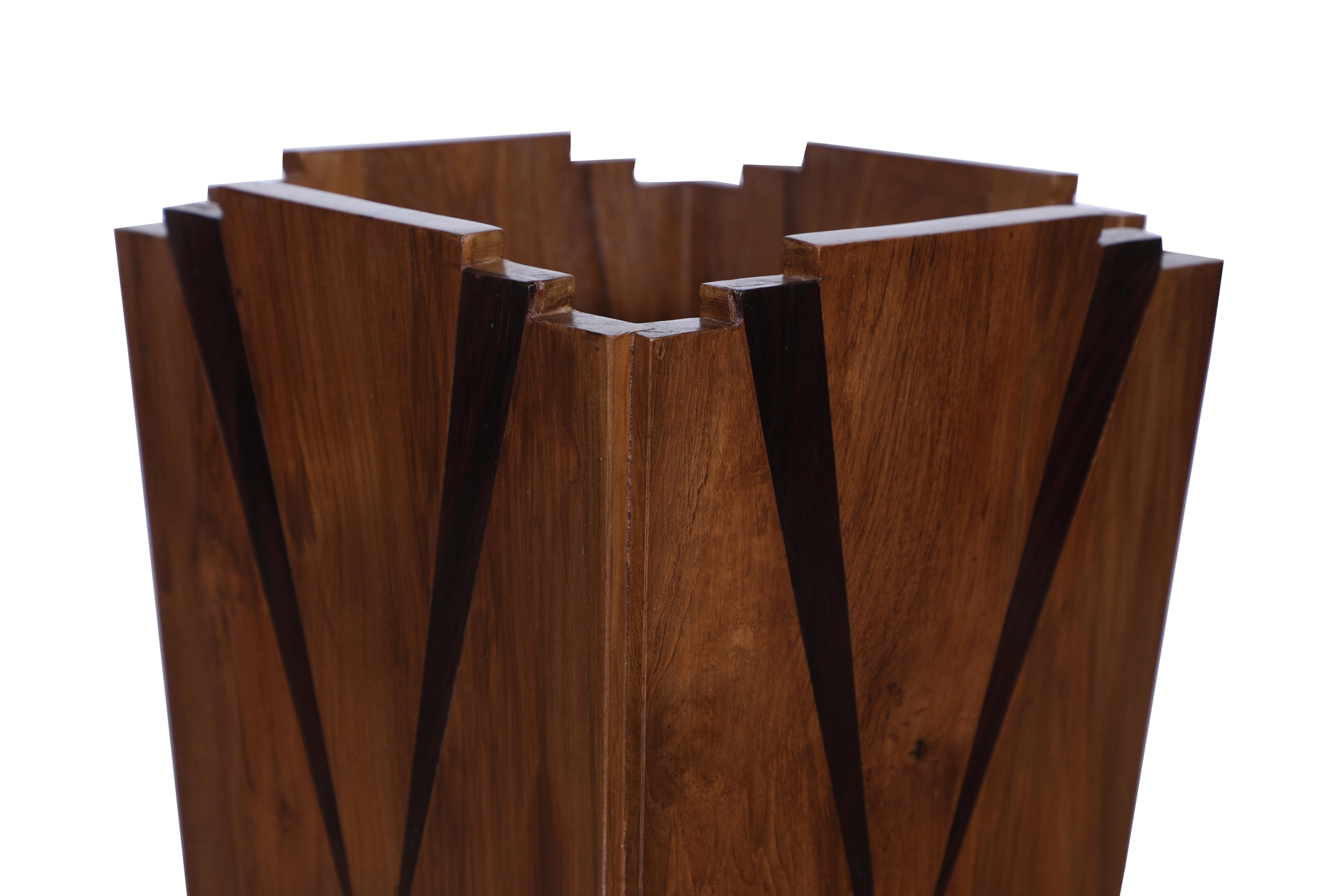 Teak Art Deco waste paper basket or use as a planter with details indicative of the era.  Tapered design with a stepped architectural top edge and rosewood inlay in a traditional chevron design.

The Lockhart Collection is a personally curated