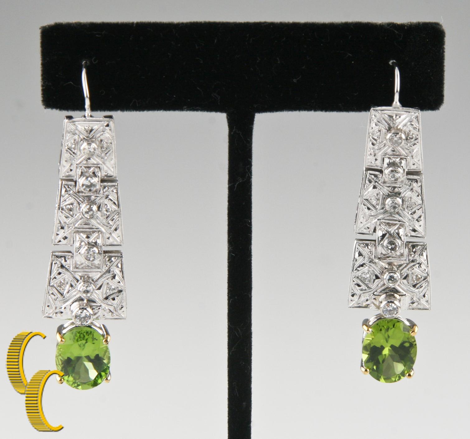 Oval Cut Art Deco Style Green Peridot and Diamonds Dangle Earrings Set in 14 Karat Gold For Sale