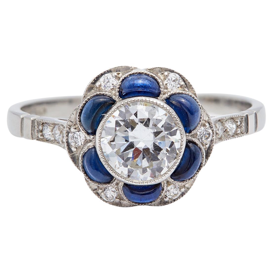 Art Deco Inspired 0.73 Carat Old European Diamond Sapphire Platinum Flower Ring For Sale