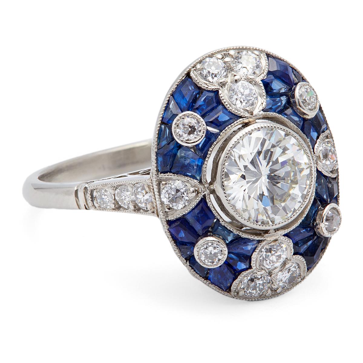 Women's or Men's Art Deco Inspired 0.81 Carat Round Brilliant Diamond and Sapphire Platinum Ring For Sale