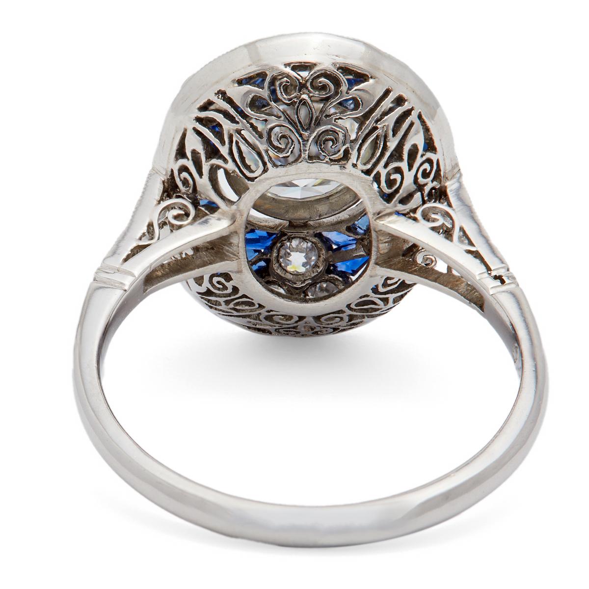 Art Deco Inspired 0.81 Carat Round Brilliant Diamond and Sapphire Platinum Ring For Sale 1