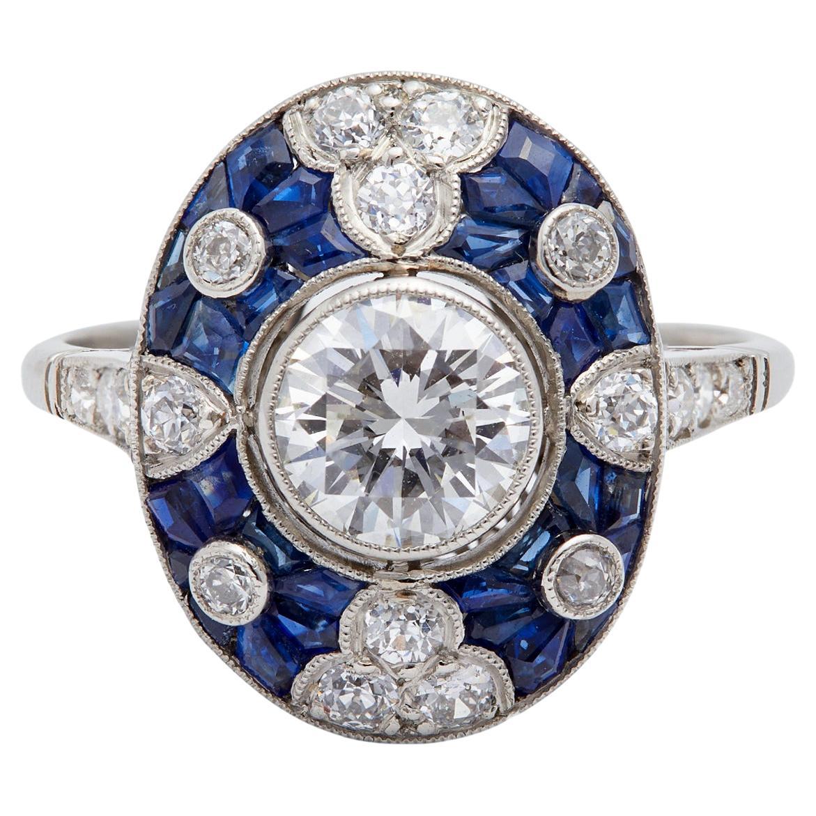 Art Deco Inspired 0.81 Carat Round Brilliant Diamond and Sapphire Platinum Ring