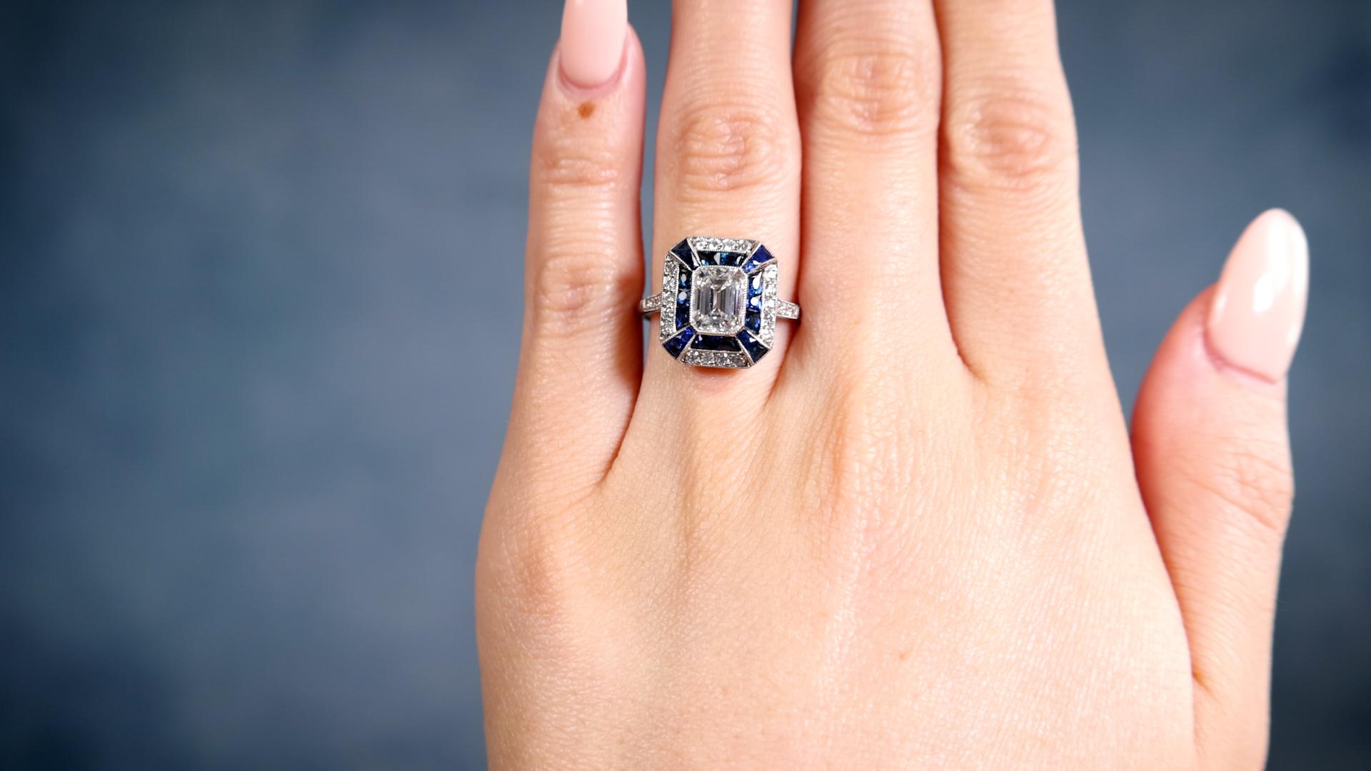 Art Deco Inspired 1.06 Carat Emerald Cut Diamond Sapphire Platinum Ring In Excellent Condition For Sale In Beverly Hills, CA