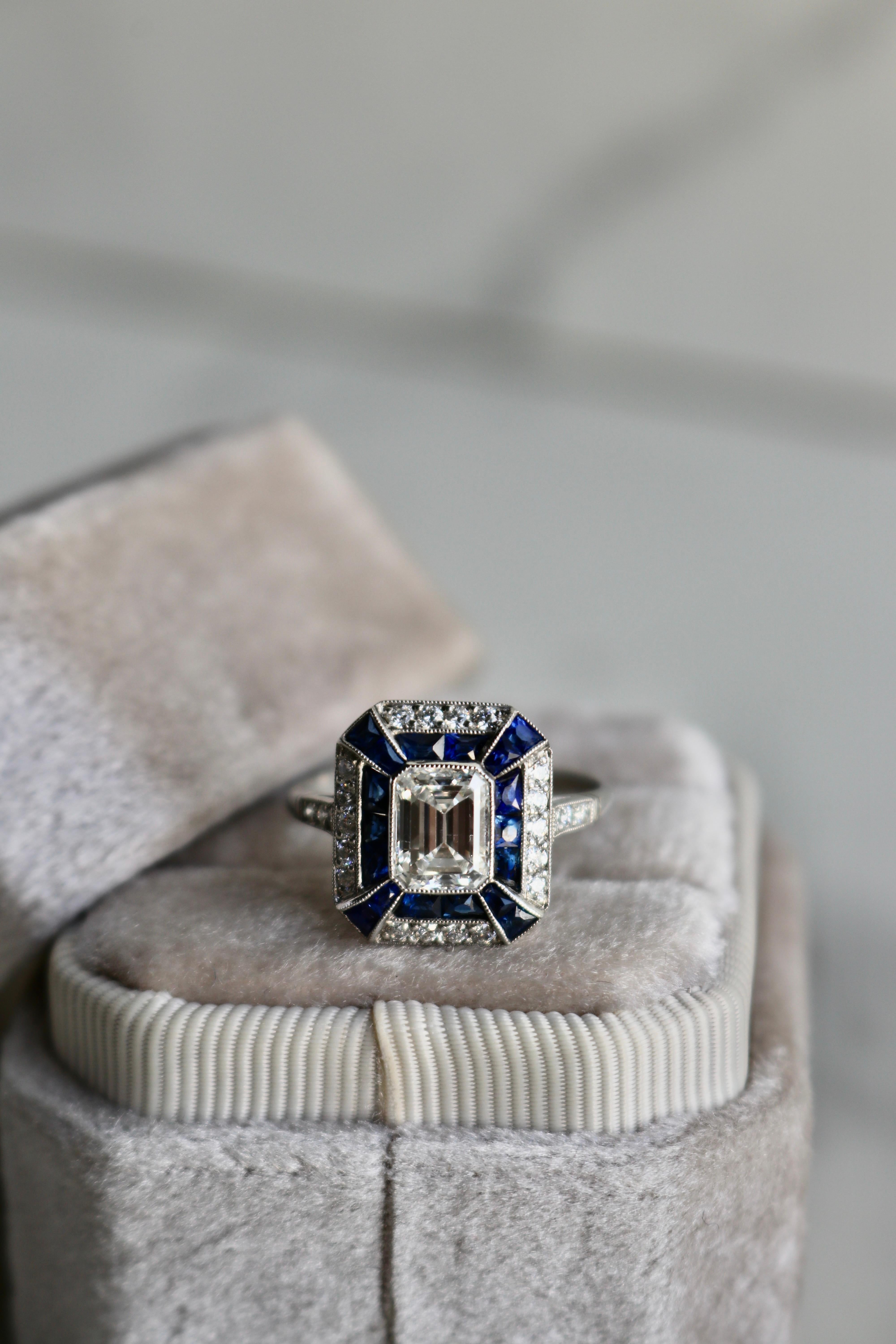 Art Deco Inspired 1.06 Carat Emerald Cut Diamond Sapphire Platinum Ring For Sale 2