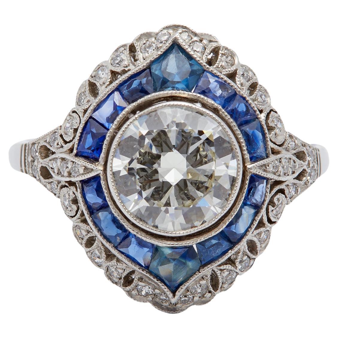 Art Deco Inspired 1.30 Carat Round Brilliant Diamond Sapphire Platinum Ring For Sale