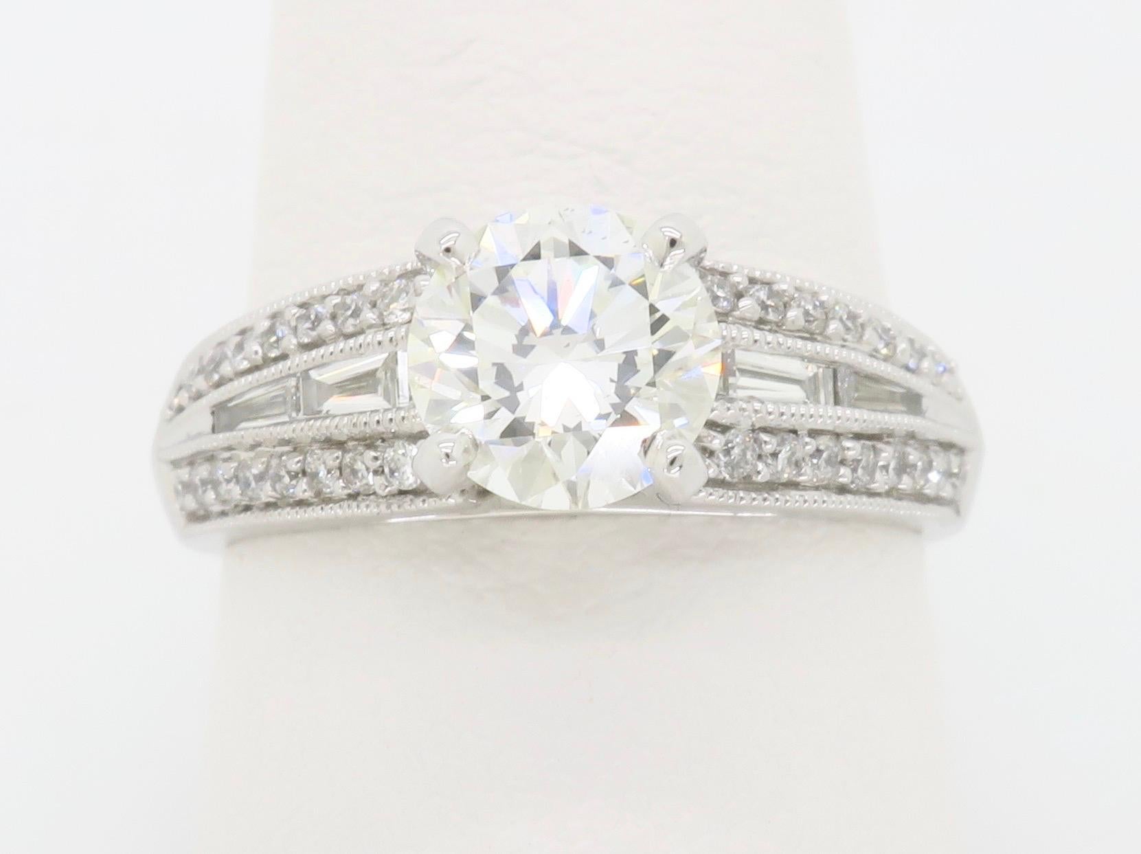 Unique diamond engagement ring with 1.48ct of diamonds. 

Center Diamond Carat Weight: 1.08CT
Center Diamond Cut: Round Brilliant  
Center Diamond Color: J
Center Diamond Clarity: VS2
Total Diamond Carat Weight: Approximately 1.48CTW
Metal: 14k